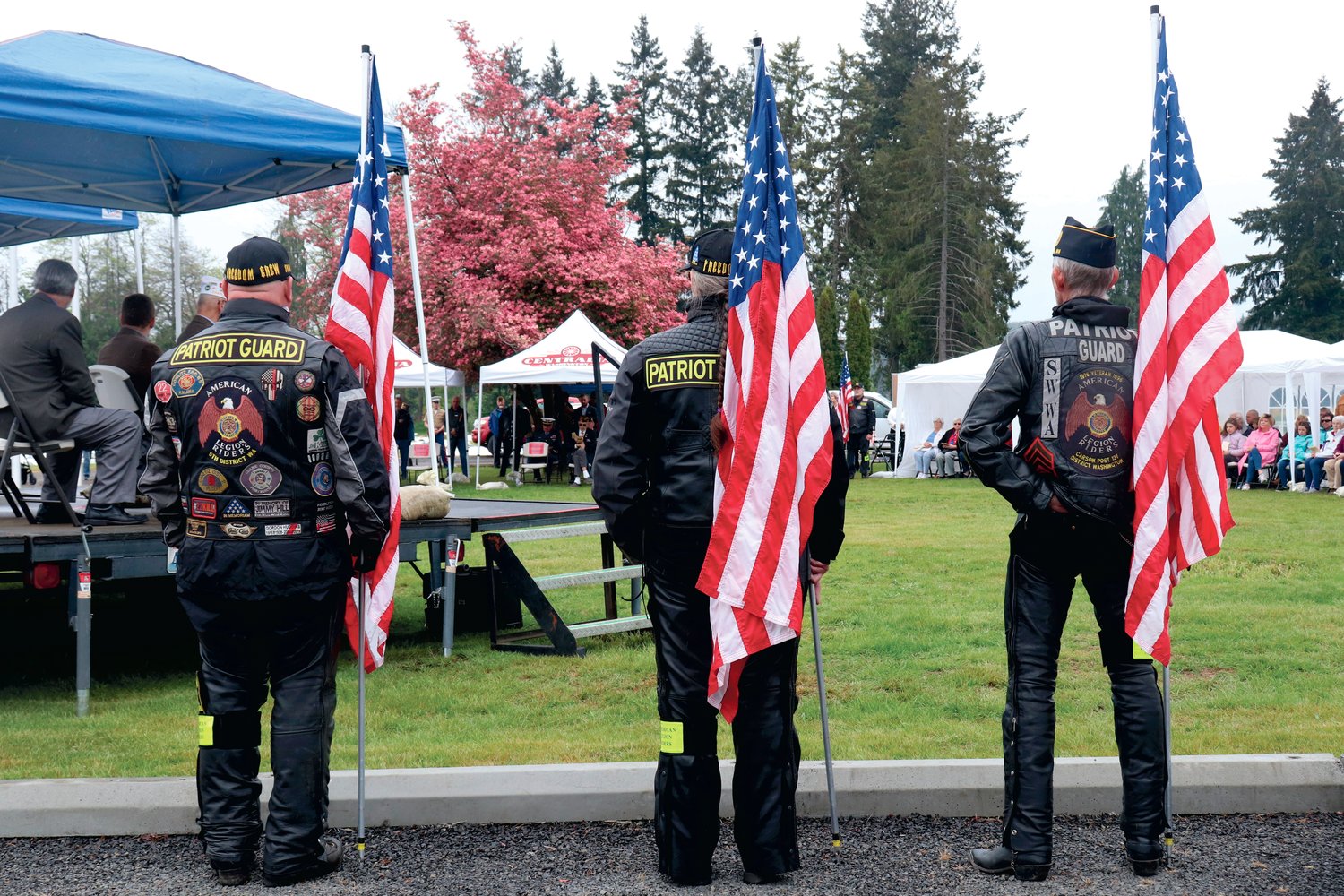 Patriot Guard riders with Post 25 American Legion stand at attention during the Sticklin Greenwood Memorial Park Rededication Ceremony in Centralia on Saturday.