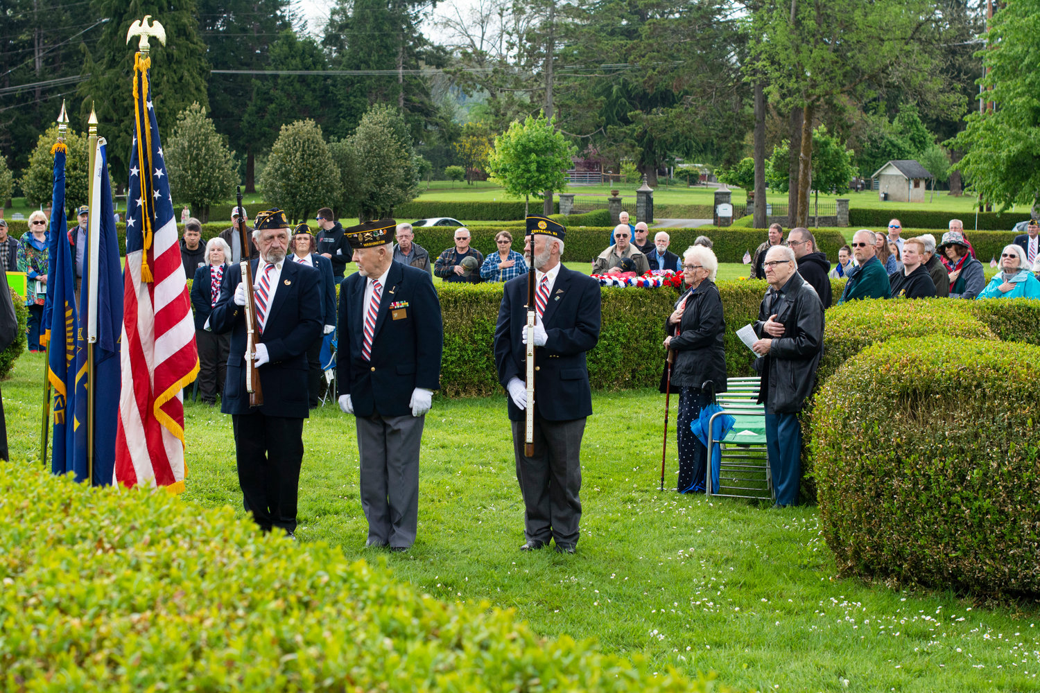 Veterans serve as the color guard on Monday during the Memorial Day ceremony at Claquato Cemetery.