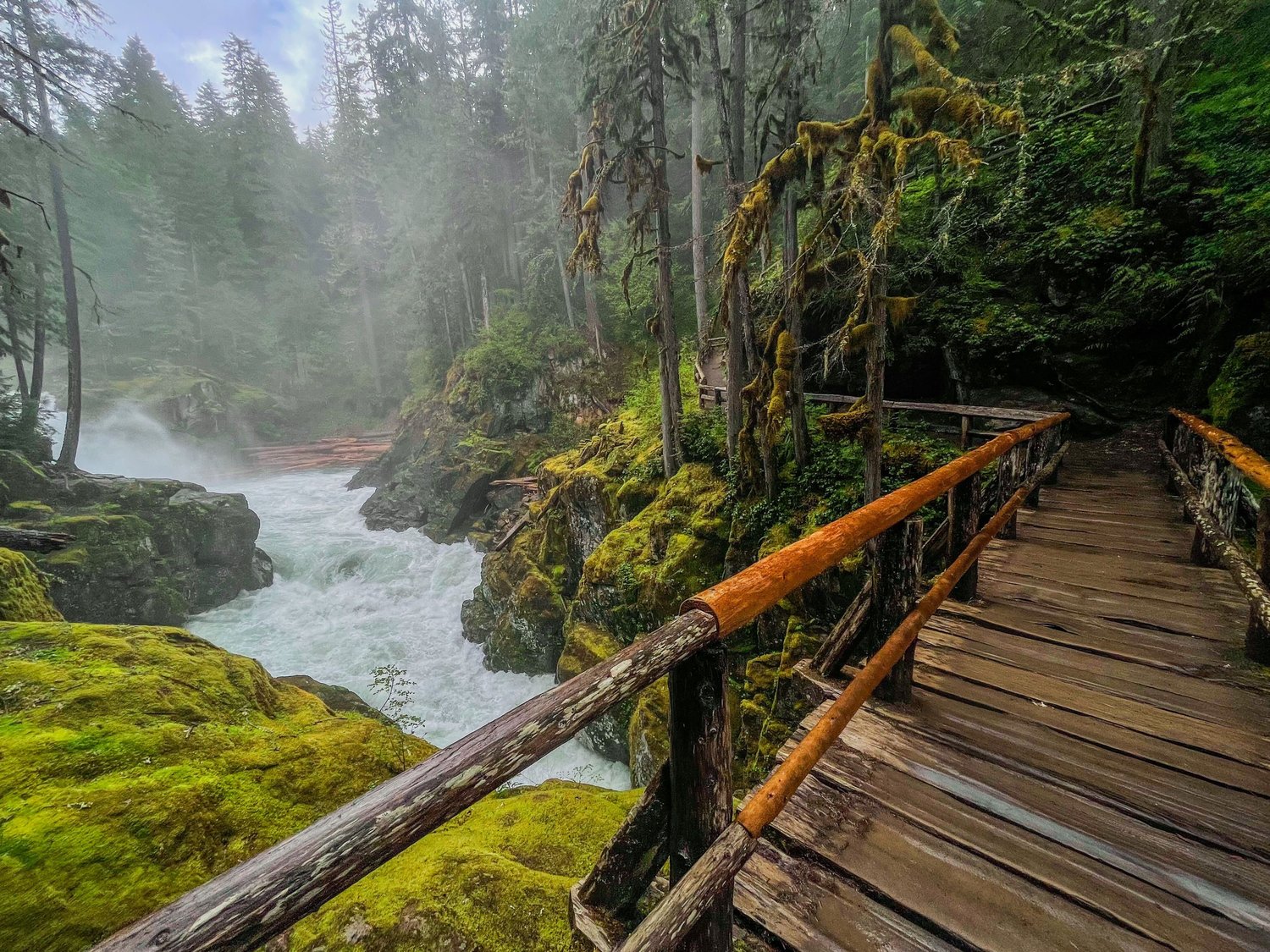A wooden bridges stretches over the Ohannapecosh River near Silver Falls in Mount Rainier National Park on Sunday, June 5, 2022.