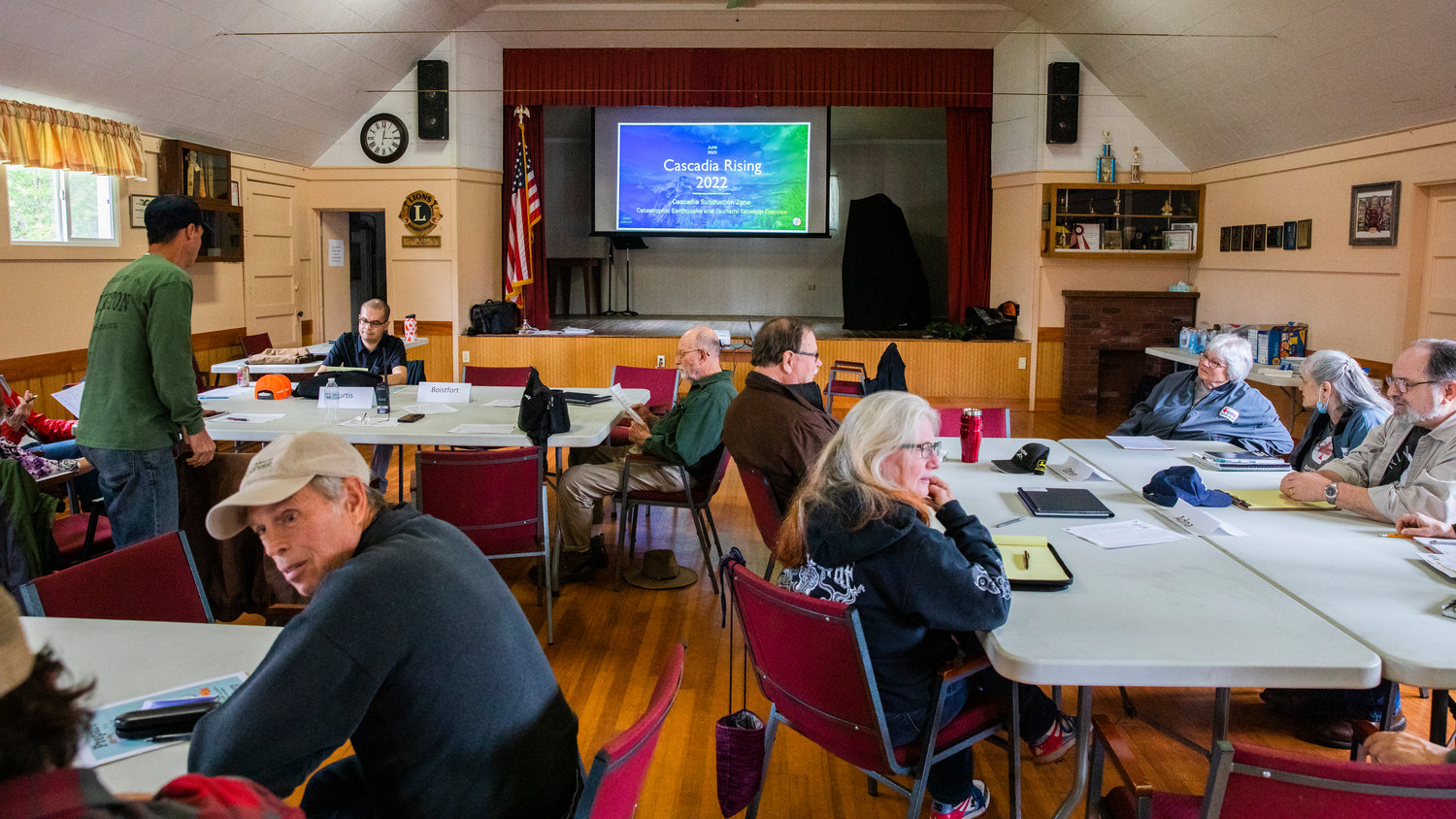 West Lewis County residents gather at the Baw Faw Grange on Monday to discuss the Cascadia Subduction Zone earthquake during one of several Lewis County earthquake preparedness meetings across the county this week.