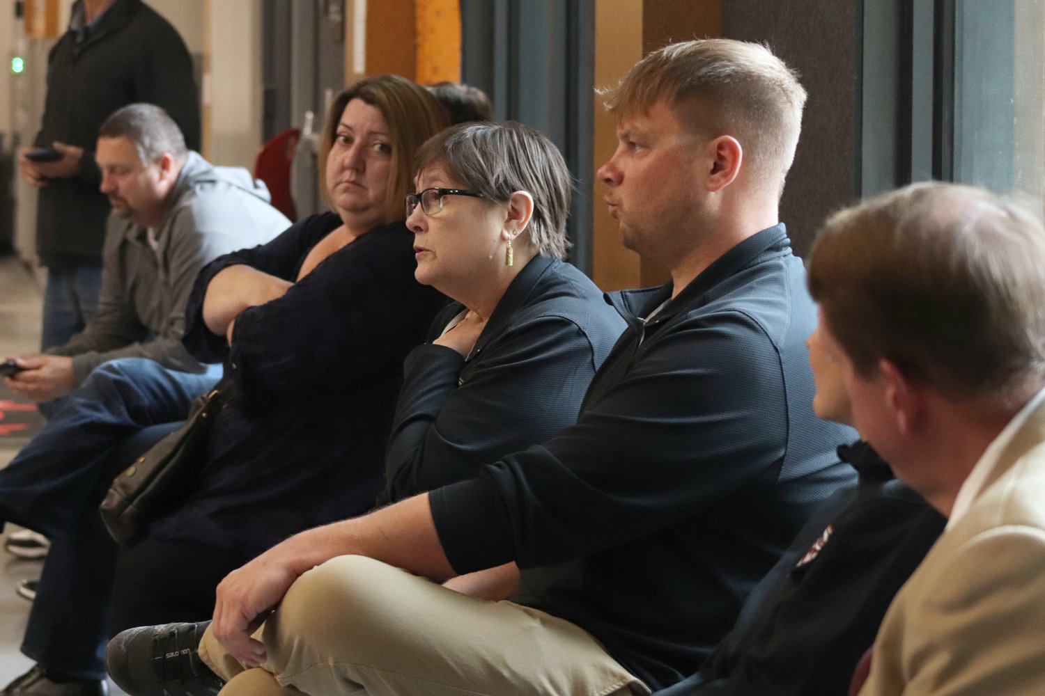 Toledo School Board Vice Chair Heidi Buswell answers questions during a community meeting at Toledo High School on Tuesday.