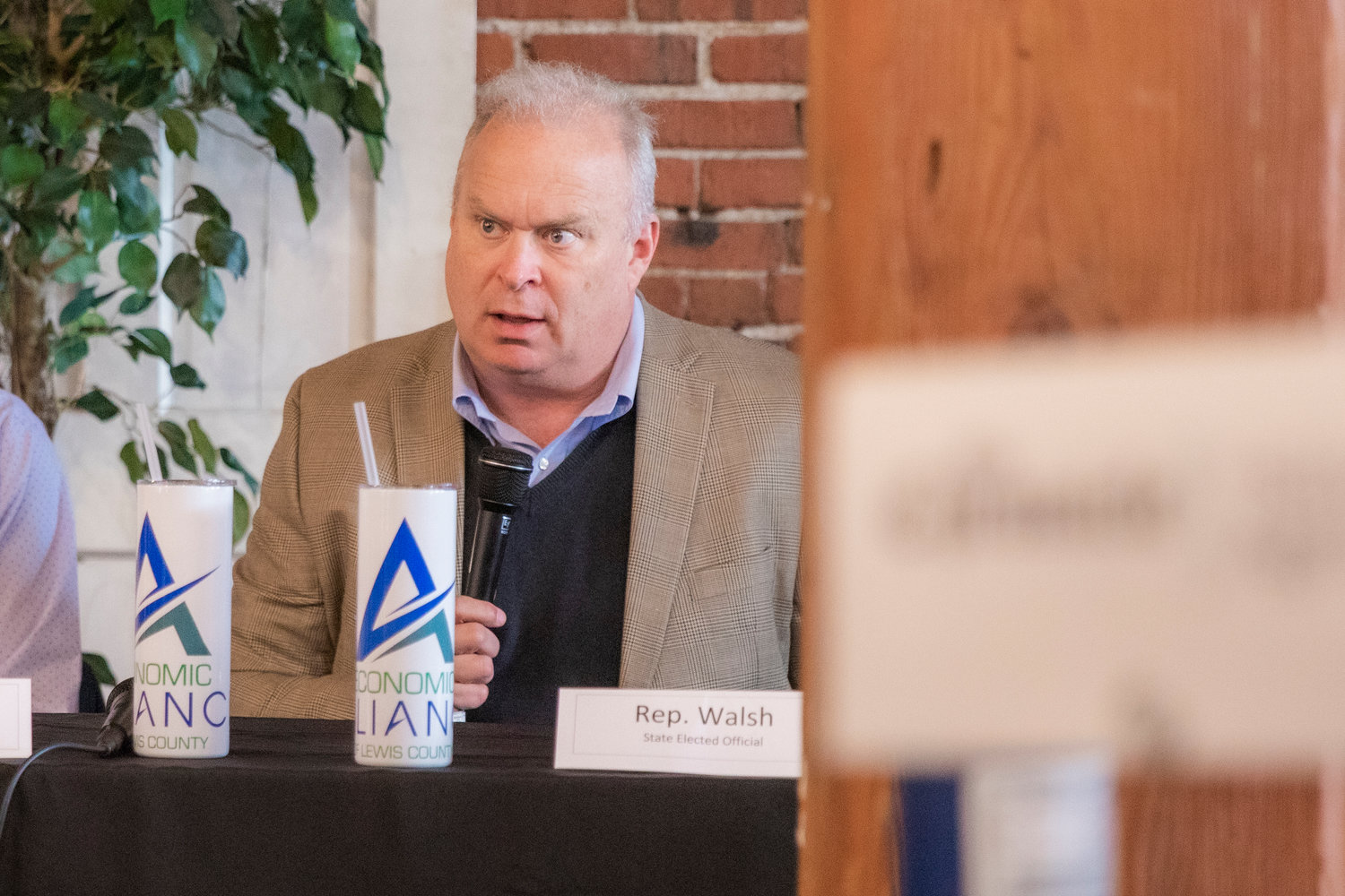 State Rep. Jim Walsh speak to attendees at an Economic Alliance Summit event in Chehalis on Thursday.