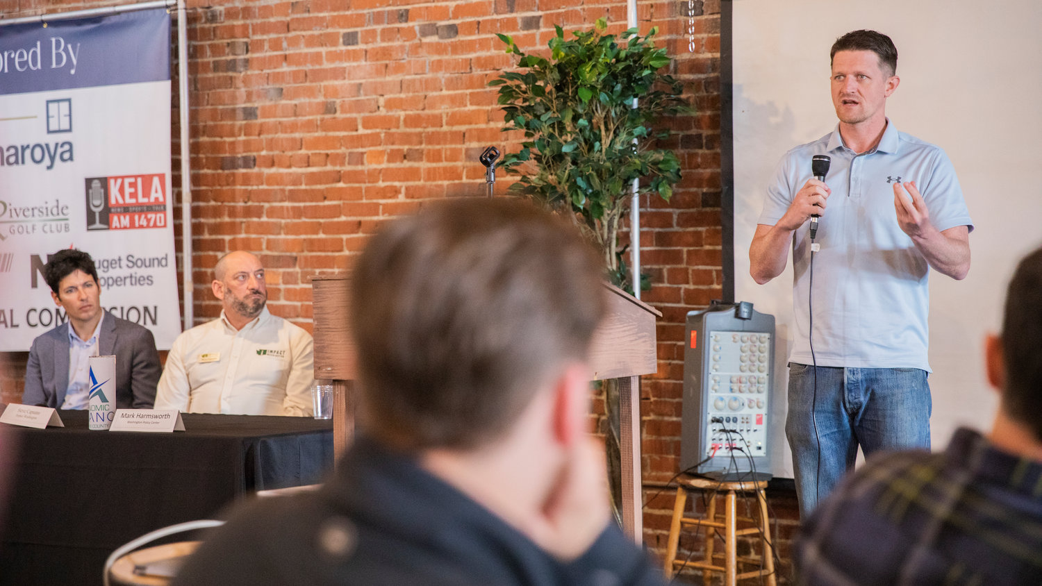 Joel McEntire speaks at The Loft for an Economic Alliance Summit event in Chehalis on Thursday.