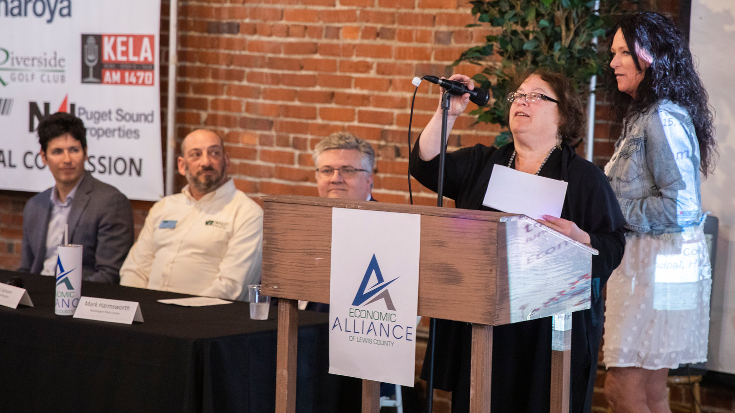 Cynthia Mudge, with the Centralia-Chehalis Chamber of Commerce, speaks at The Loft for an Economic Alliance Summit event in Chehalis on Thursday.