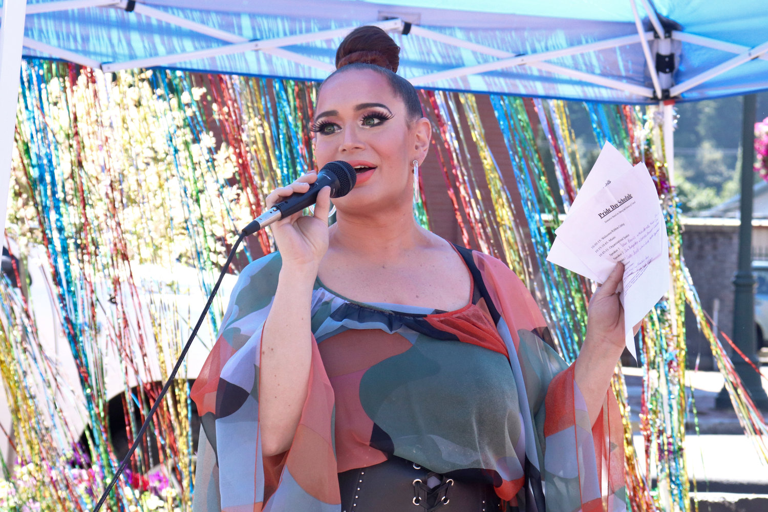 Sophia Sinclair emcees the entertainment lineup at Lewis County Pride in Centralia on Saturday.
