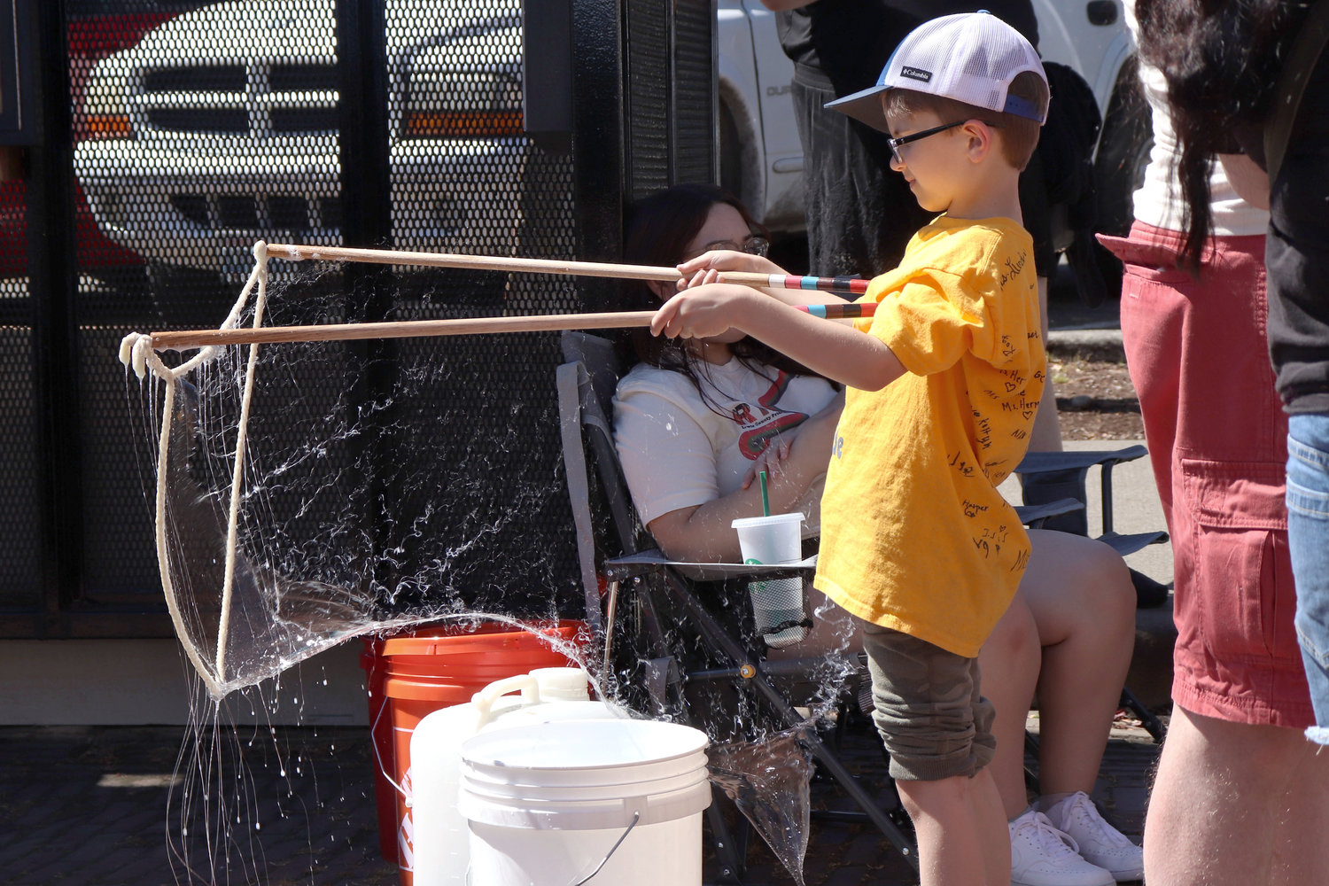 Stanford Castonguay, 7, doesn’t react as his giant bubble pops during Lewis County Pride in Centralia on Saturday.