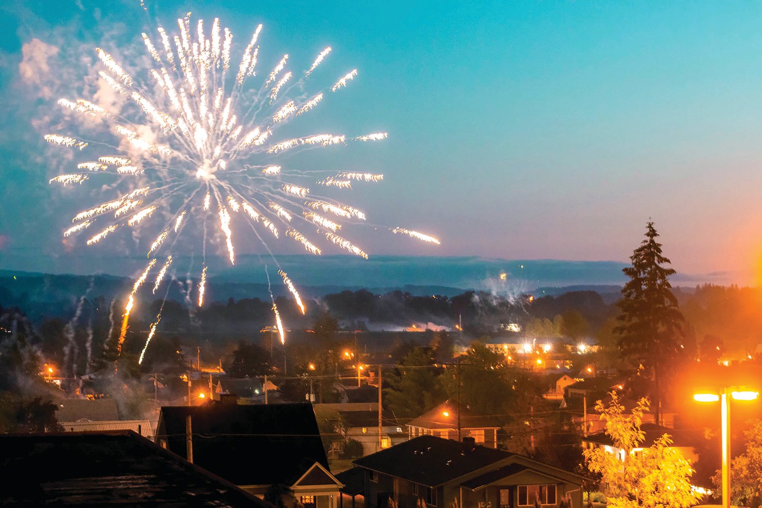 Fireworks explode over Chehalis as residents celebrate Independence Day in this 2020 Chronicle file photo.