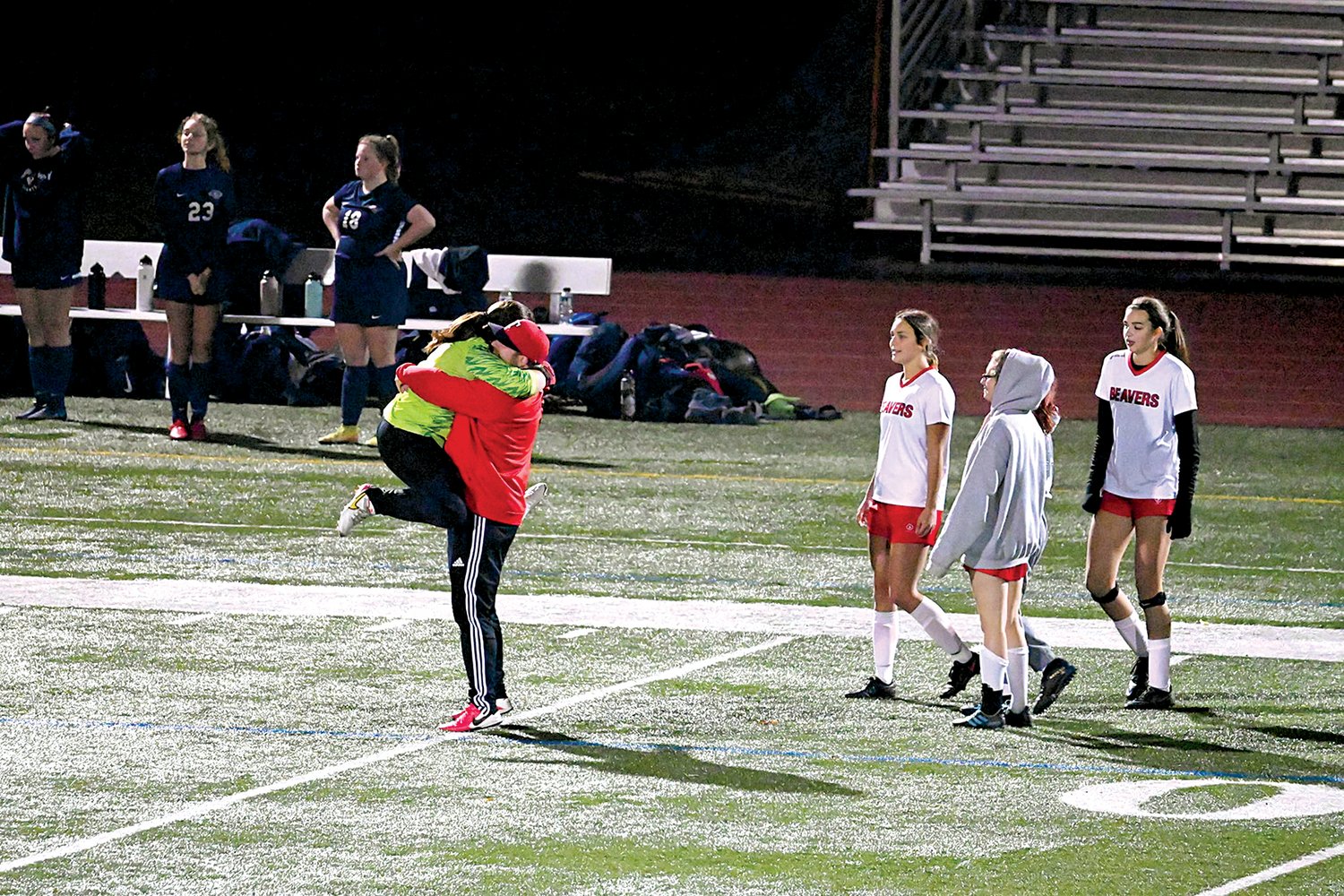 Tenino assistant coach Dave Montgomery celebrates after win during the 2021 season.