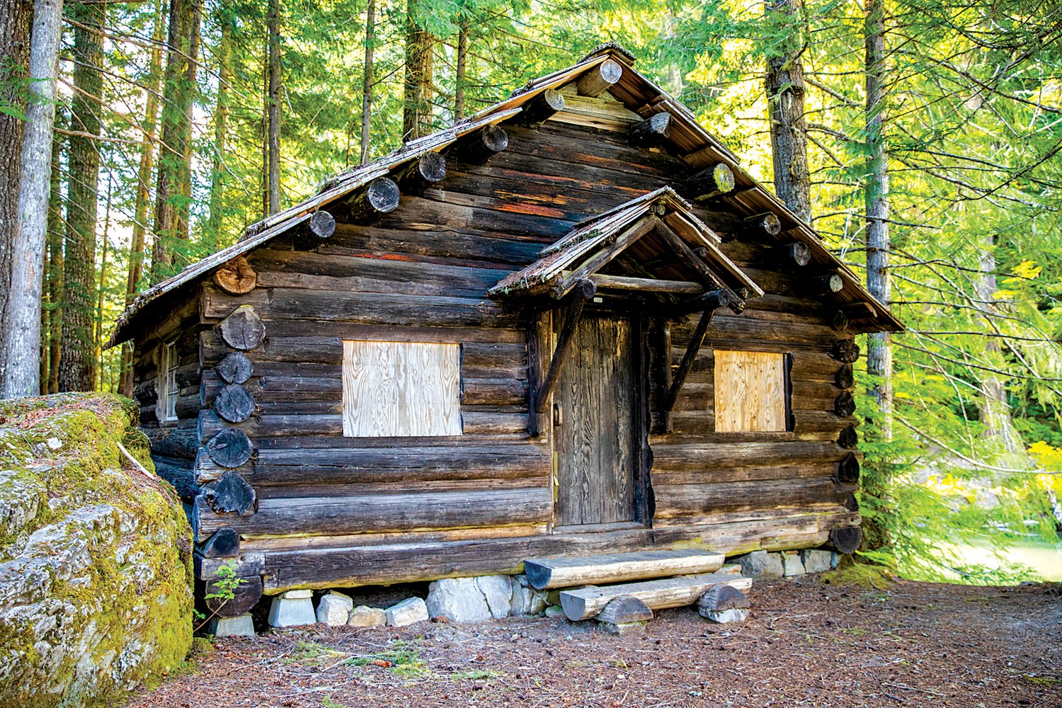 A log cabin stands along the Packwood Lake trail Wednesday in the Gifford Pinchot National Forest.