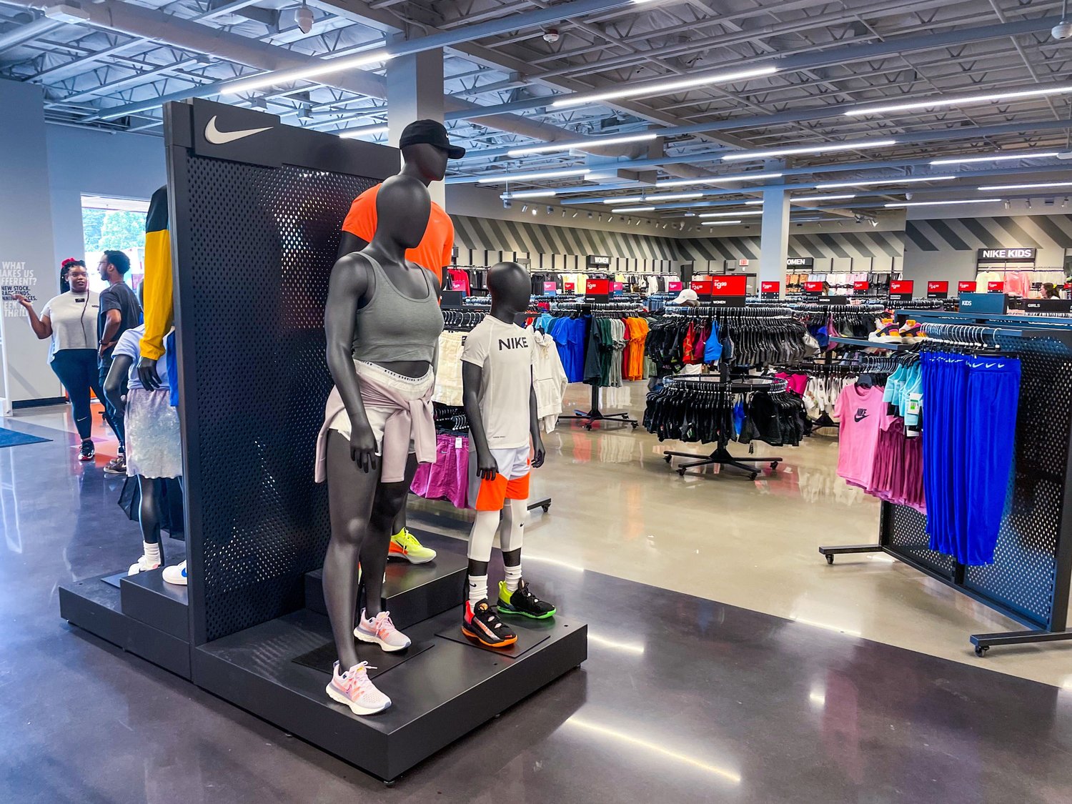 Clothing stretches wall to wall at the new Nike Clearance Store that opened Thursday in Centralia.