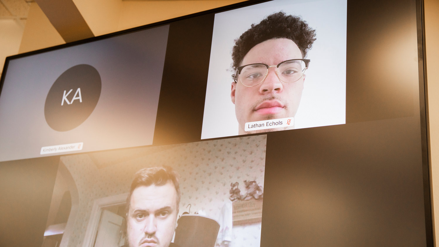 Seattle rapper Lil Mosey, born Lathan Moses Echols, appears in Lewis County Superior Court, via Webex, Friday in Chehalis. Below him on the screen is his defense attorney, Shane O’Rourke.