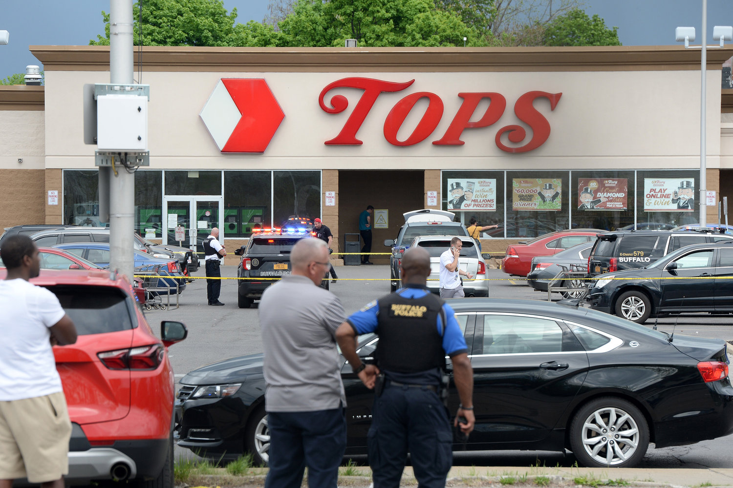 Police on scene at a Tops Friendly Market on Saturday, May 14, 2022, in Buffalo, New York. Ten people were killed after a mass shooting at the store. (John Normile/Getty Images/TNS)