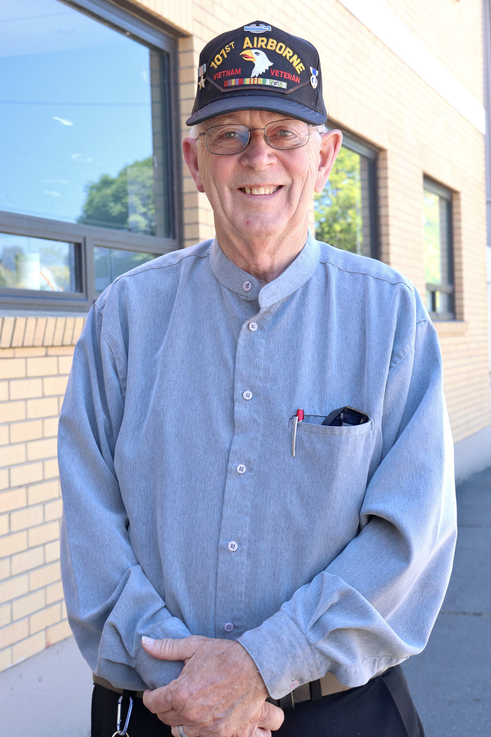Randy Pennington poses for a photo in downtown Centralia on Tuesday. He retired from the Toledo Police Department on July 5 after 36 years with the department as a reserve officer.