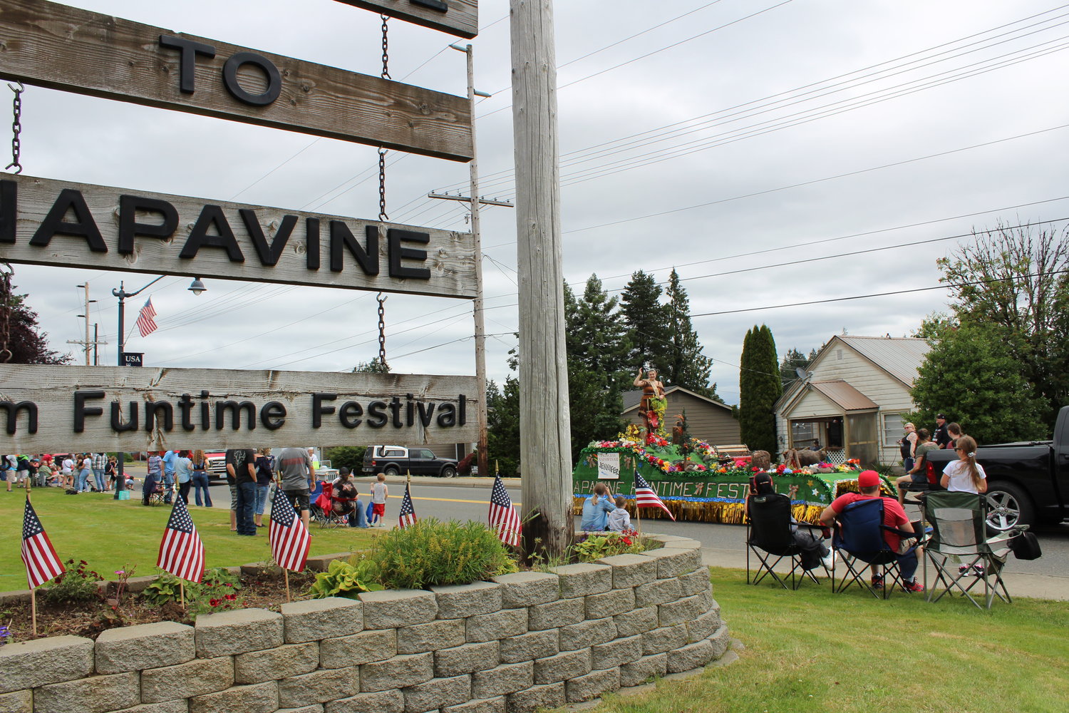 The Napavine Funtime Festival parade winds its way past the Napavine City sign Saturday.