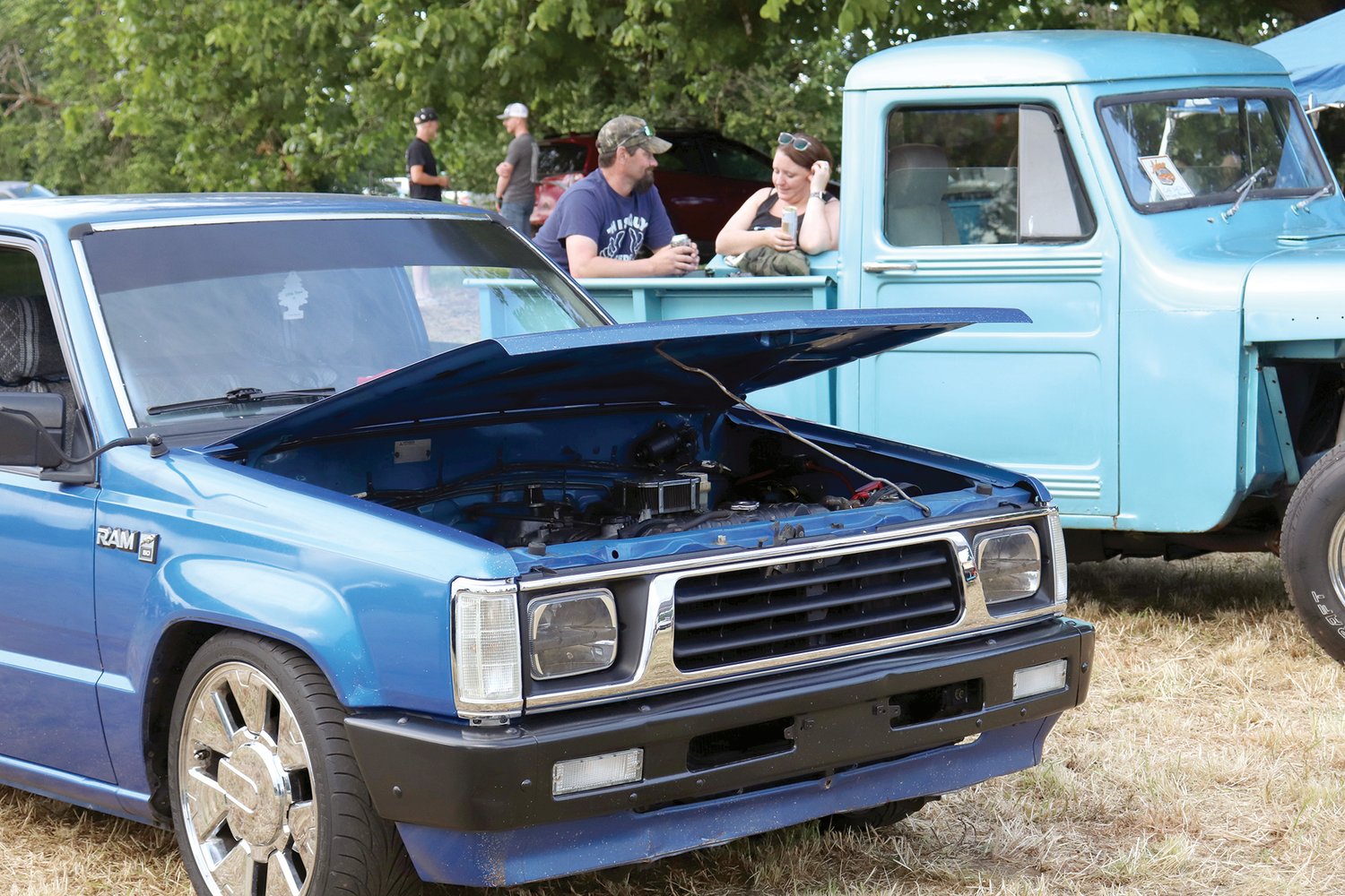An open hood displays a car’s engine at the Adna Camp & Cruise Car Show in Adna on Friday.