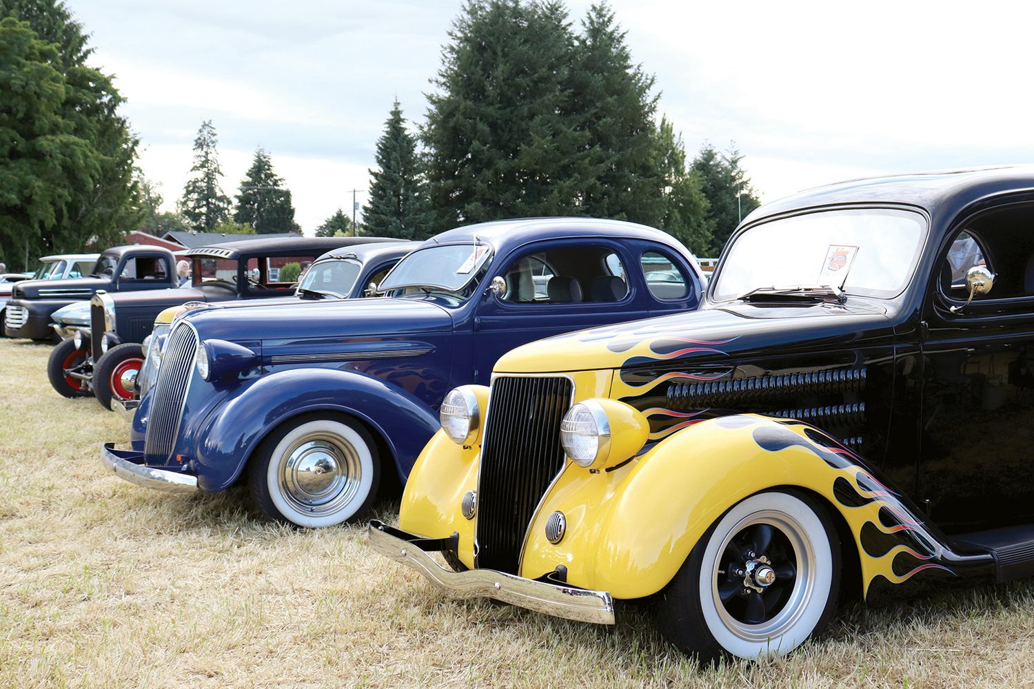 Vehicles are on display at the Adna Camp & Cruise Car Show in Adna on Friday.