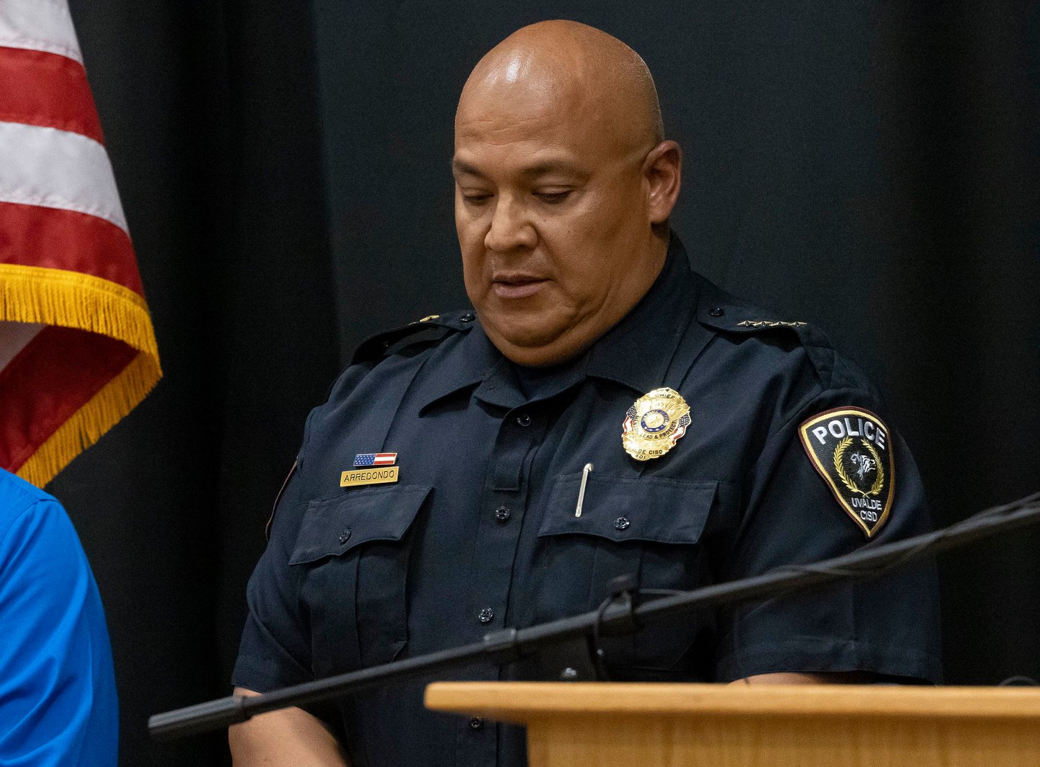 Uvalde schools police Chief Pedro "Pete" Arredondo listens during a news conference at Uvalde County Fairplex after 19 students and two teachers were killed in the shooting at Robb Elementary School on May 24, 2022, in Uvalde, Texas. Arredondo has been placed on administrative leave. (Juan Figueroa/The Dallas Morning News/TNS)