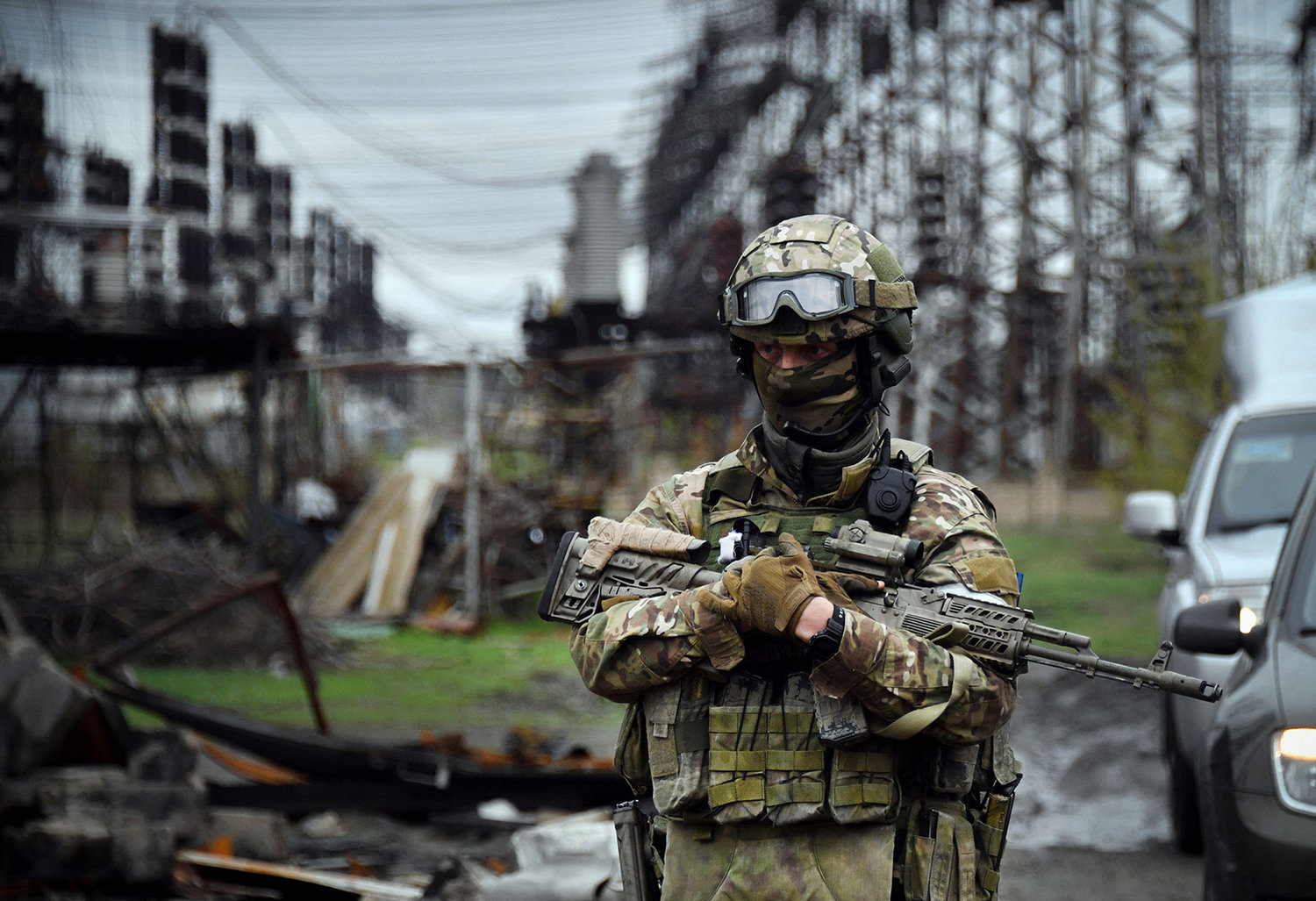 In this picture taken on April 13, 2022, a Russian soldier stands guard at the Luhansk power plant in the town of Shchastya. *EDITOR'S NOTE: This picture was taken during a trip organized by the Russian military.* (Alexander Nemenov/AFP via Getty Images/TNS)