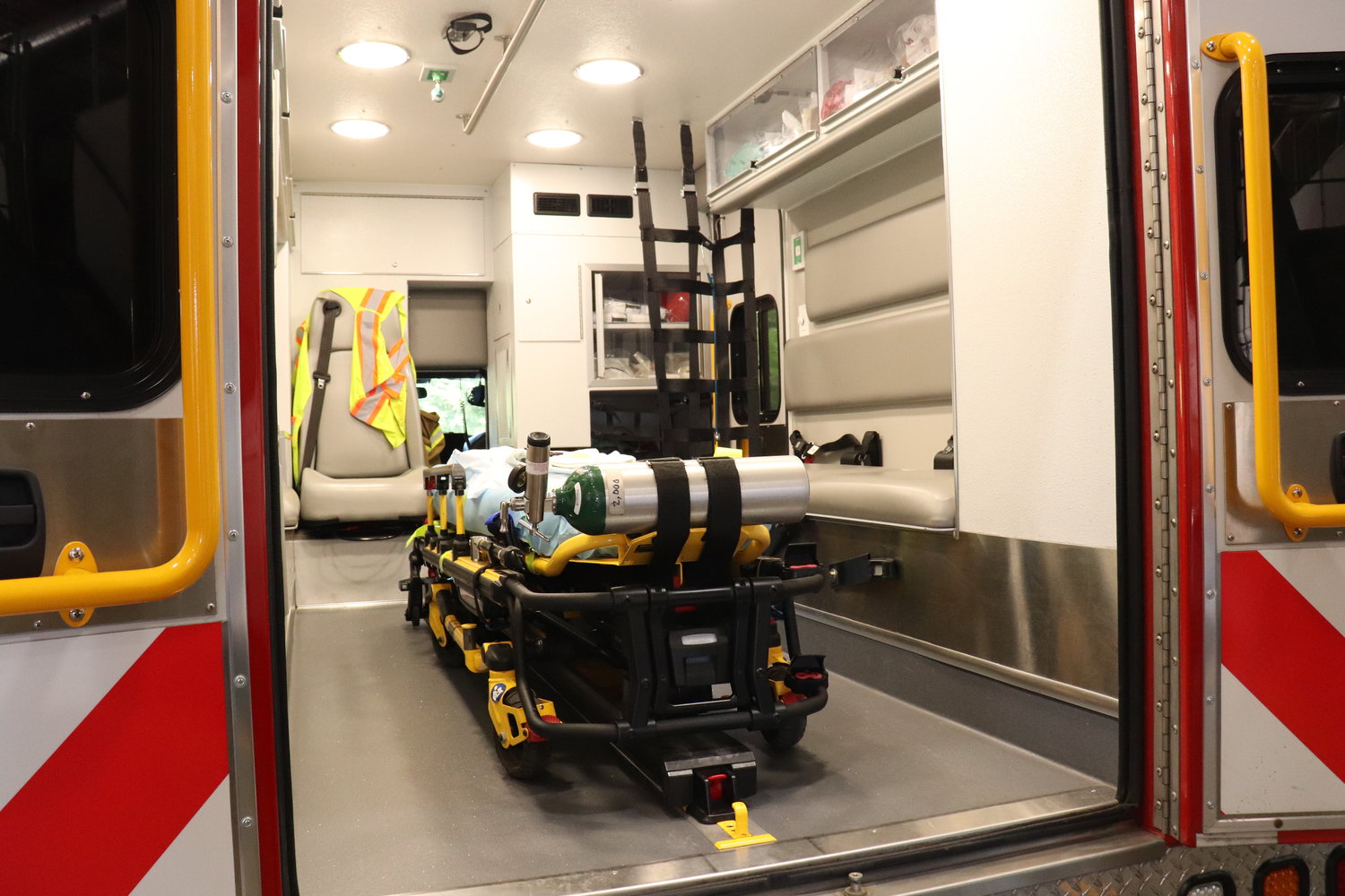 An open ambulance is pictured.