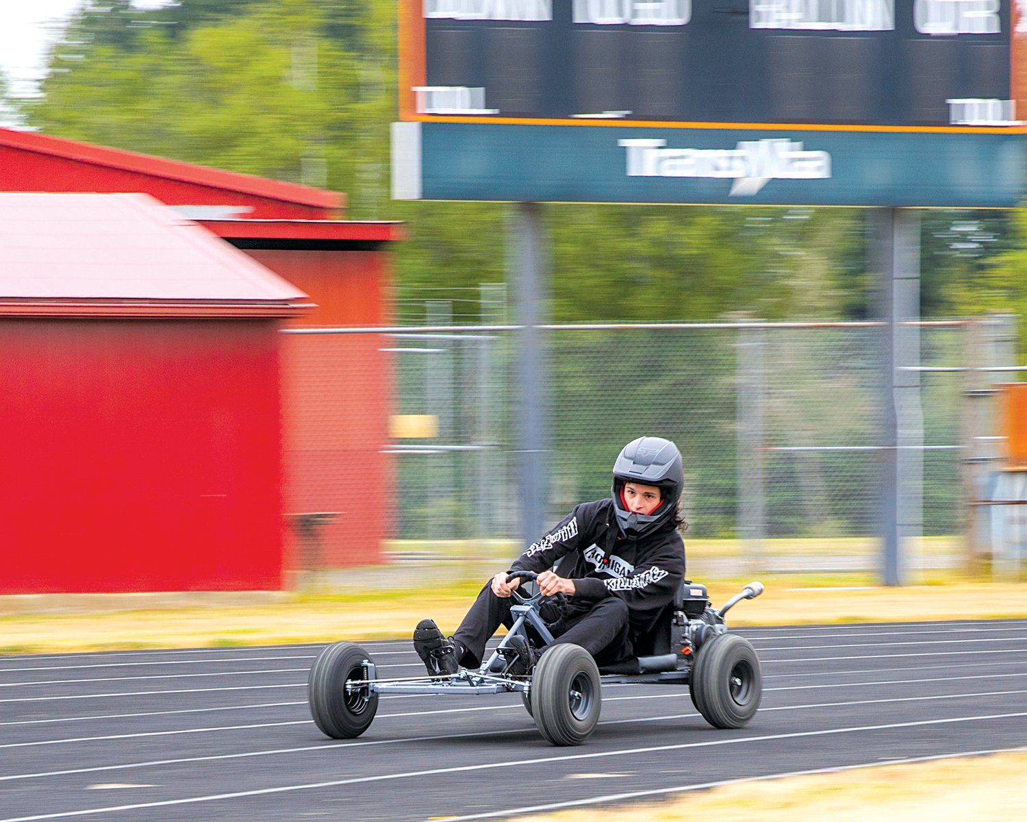Sawyer Marshall navigates a turn around the Napavine High School track on Thursday while piloting a go-kart.