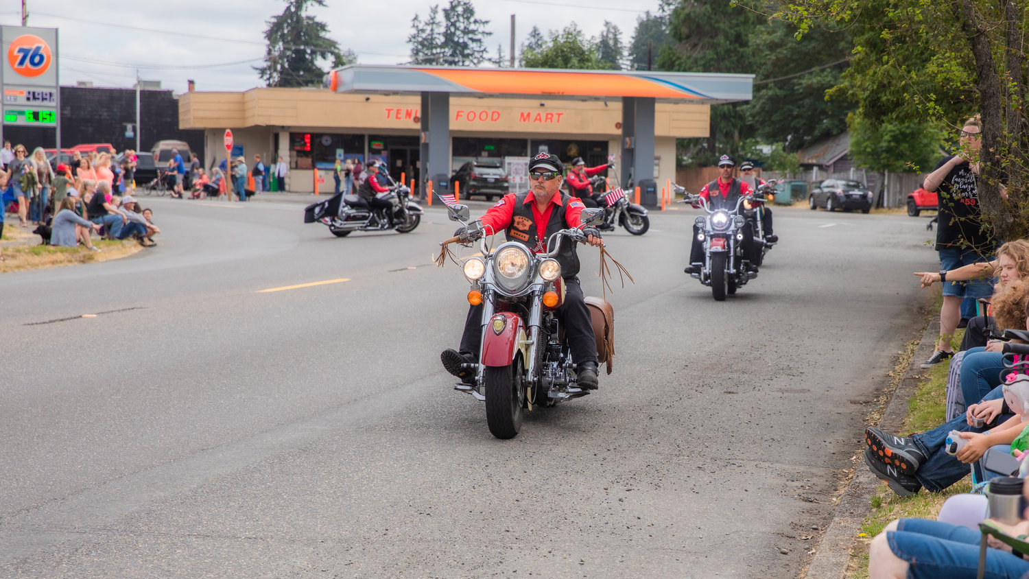 The T90 Motorcycle Drill Team performs along Sussex Avenue West in downtown Tenino to start the Oregon Trail Days parade Saturday morning.