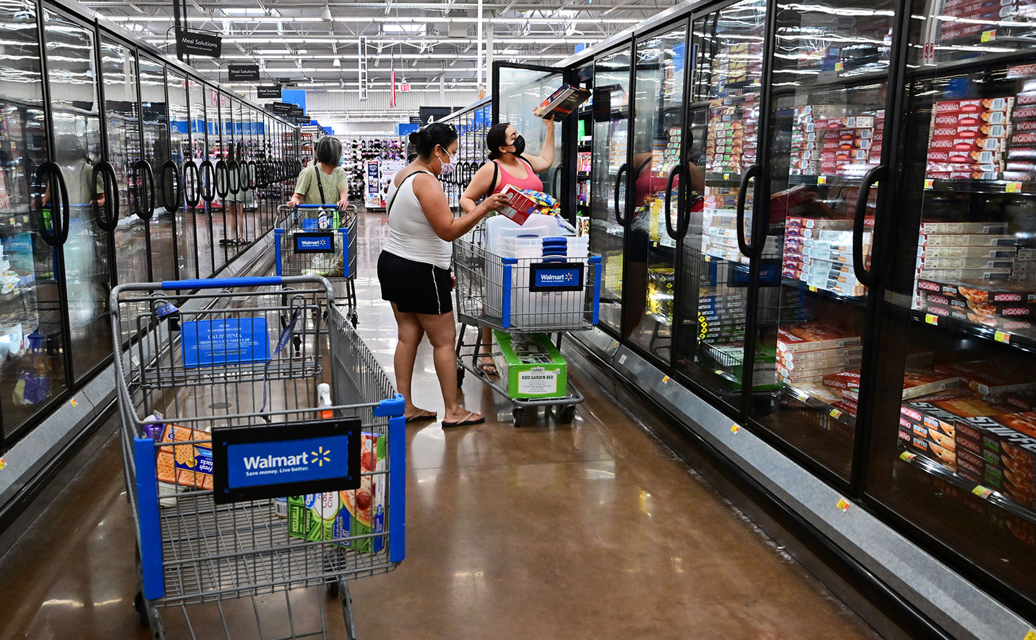 People shop for frozen food at a store in Rosemead, California, on June 28, 2022. (Frederic J. Brown/AFP via Getty Images/TNS)