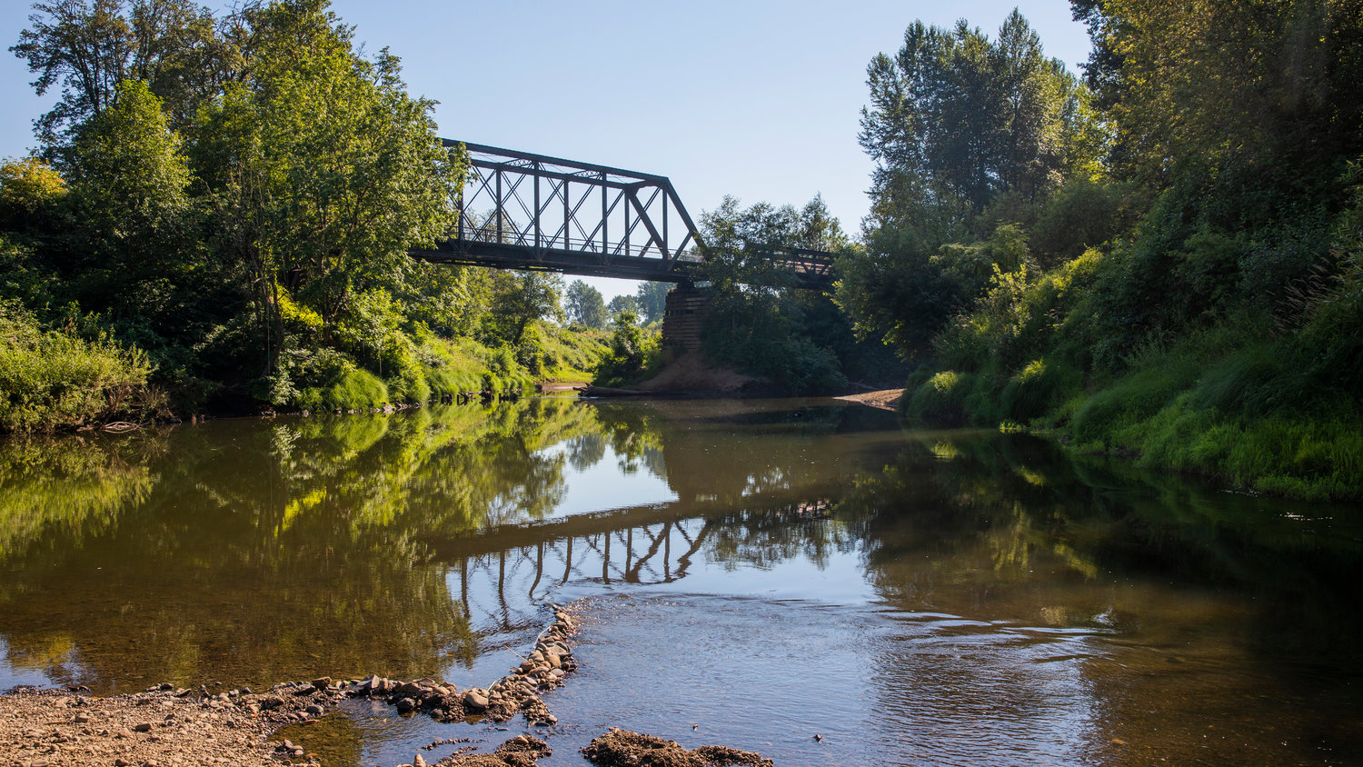 The Chehalis River is seen Friday afternoon at the trestle along the Willapa Hills Trail off Highway 603 following a drowning.