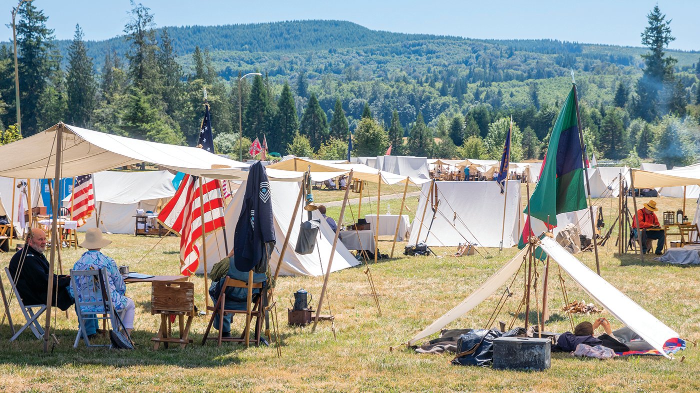 Civil War camp sites are seen during a living history reenactment in Mossyrock on Saturday. The Washington Civil War Association held its “Battle for Klickitat Creek” reenactment at the same time as the Mossyrock Blueberry Festival on Saturday and Sunday. The association reenacted battles and opened their camps up to attendees.