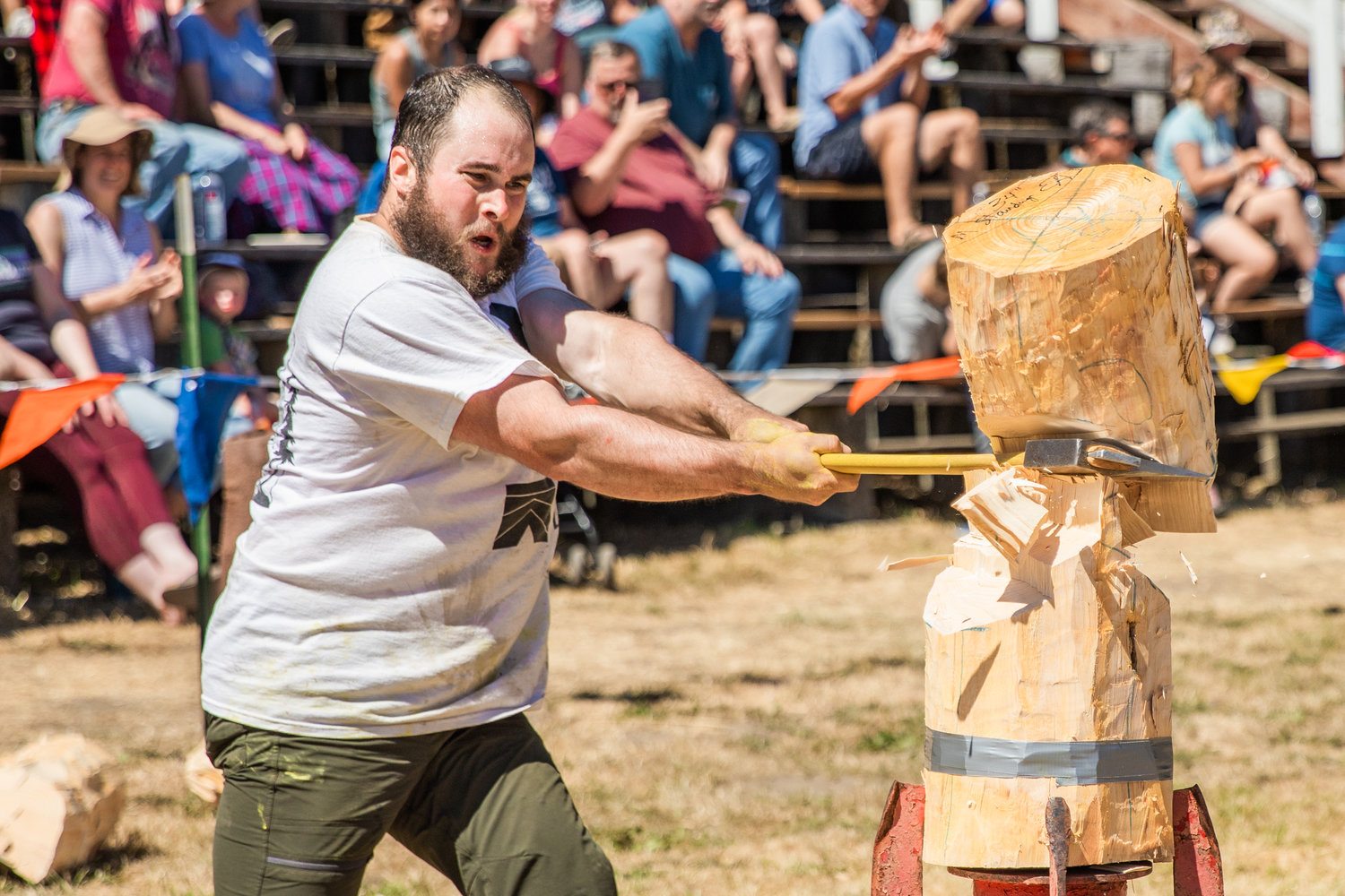 Patrick Mahoney, 30, splits a log in two during the Morton Loggers’ Jubilee on Sunday. Mahoney is an instructor in Grays Harbor College’s bachelor of forest resources program and has been competing in logging events for seven years.