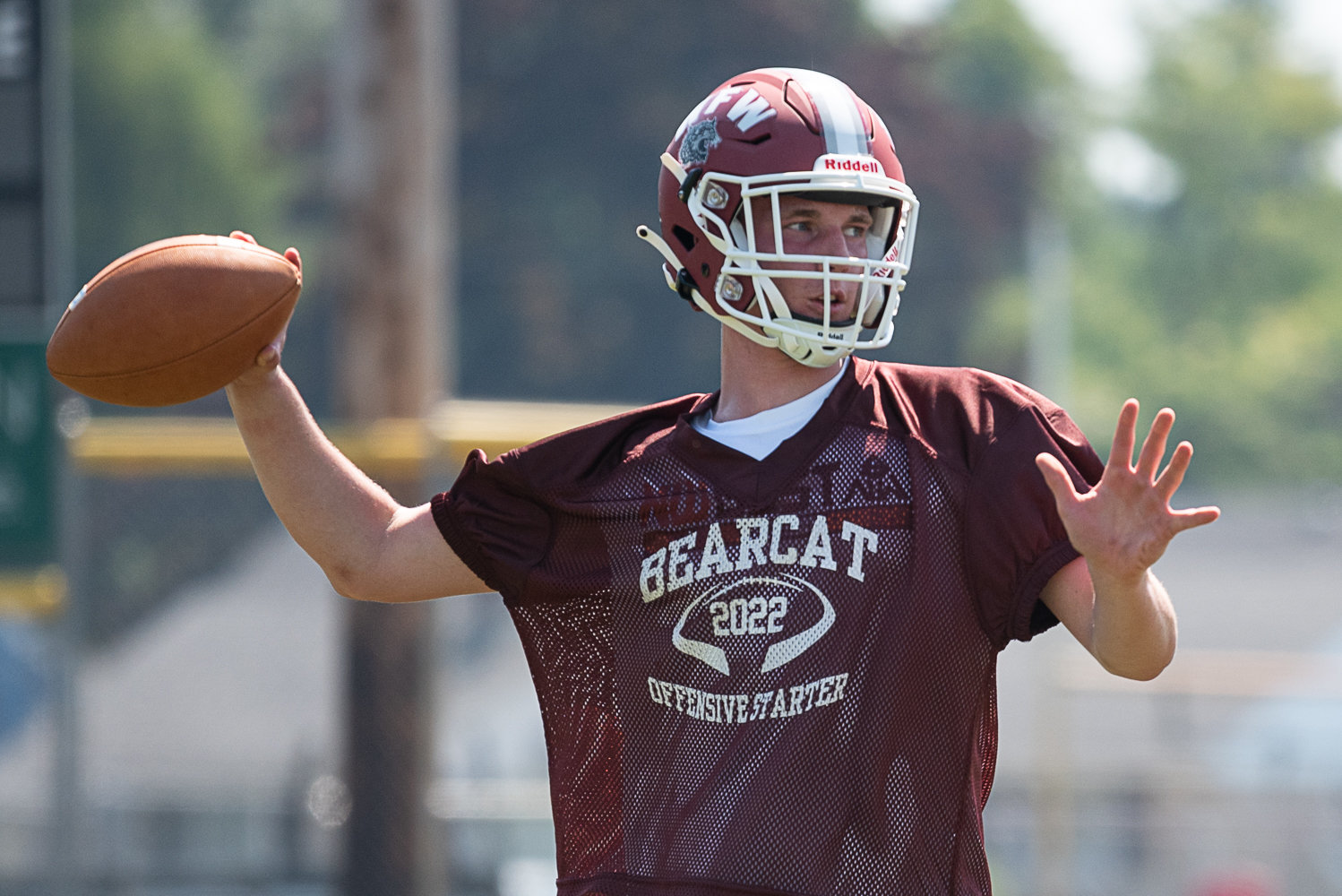 W.F. West quarterback Gavin Fugate throws a pass during a drill Aug. 17 on the first day of fall camp in Chehalis.