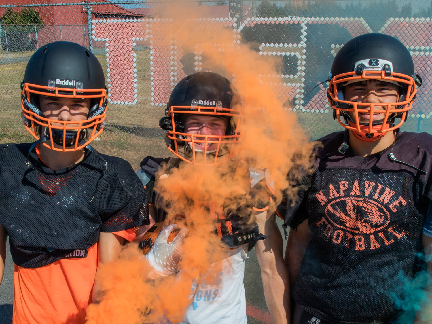 Ashton Demarest, Cael Stanley and Deacon Parker pose for a photo in their practice gear Tuesday afternoon in Napavine.