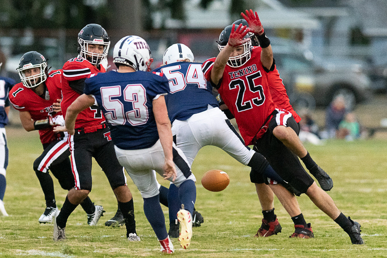 Tenino's Brody Noonan stretches to block a PWV punt Sept. 2 in Pe Ell.