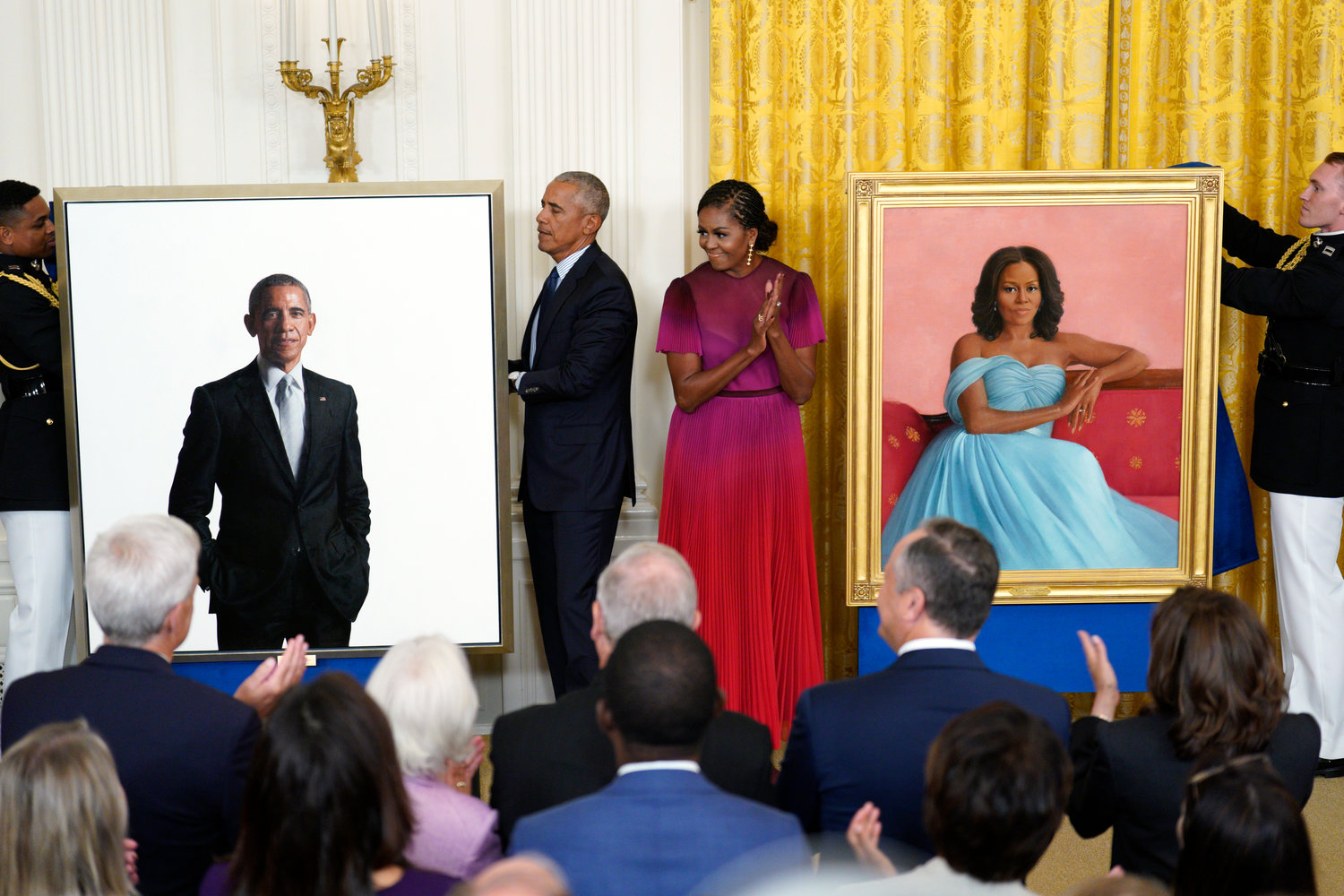 Former President Barack Obama and former first lady Michelle Obama unveil their official White House portraits during a ceremony with U.S. President Joe Biden in the East Room at the White House in Washington, D.C., on Wednesday, Sept. 7, 2022. (Yuri Gripas/Abaca Press/TNS)