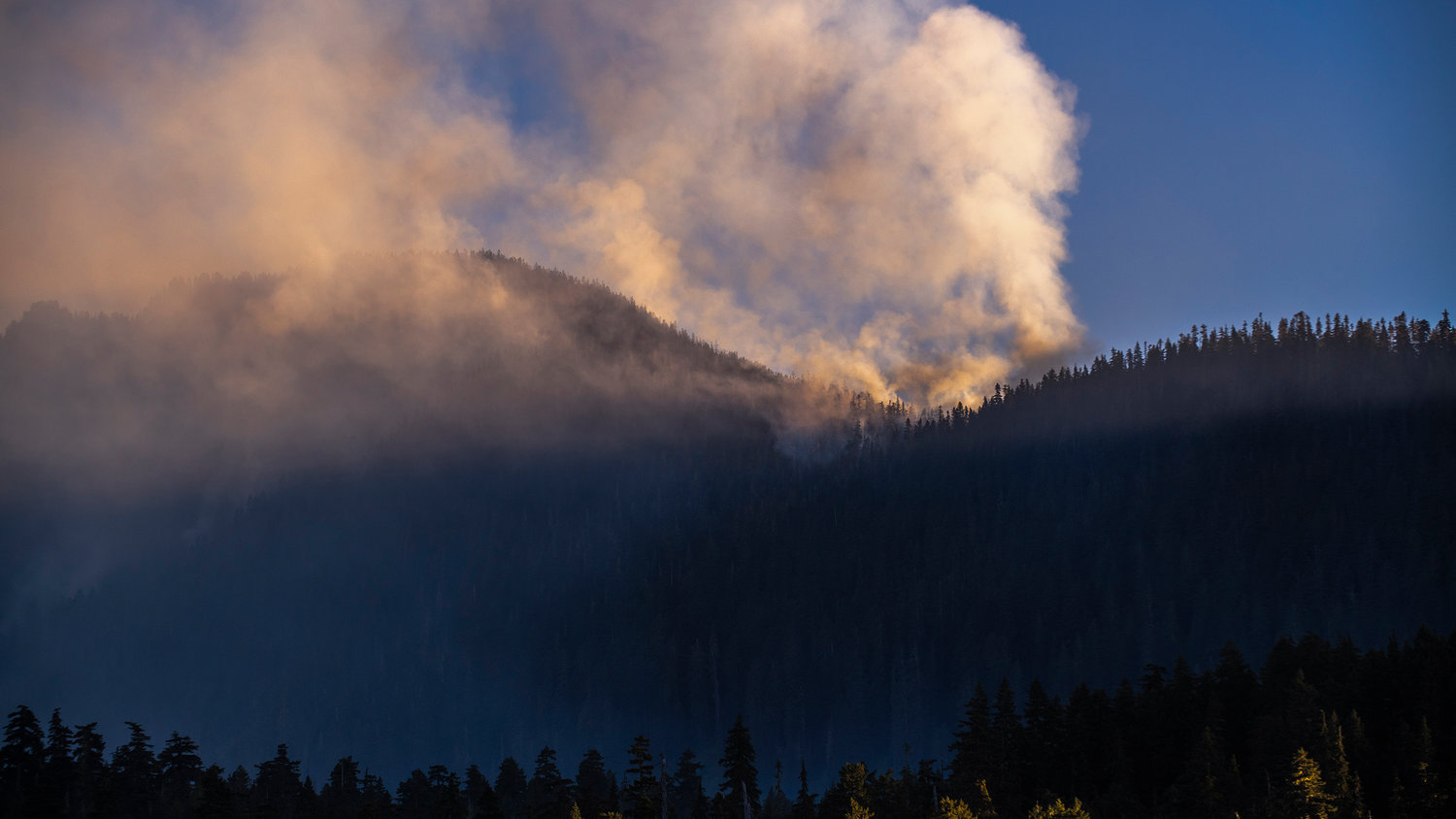 The Goat Rocks Fire smolders and burns east of Packwood on Tuesday seen from U.S. Highway 12.