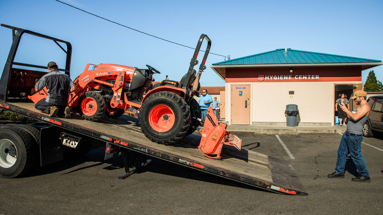 Salvation Army Centralia Captains Gin Pack and Steven Pack were among those beaming with joy as the new piece of equipment was delivered Thursday morning, purchased through a Washington state Department of Agriculture grant to increase food security.