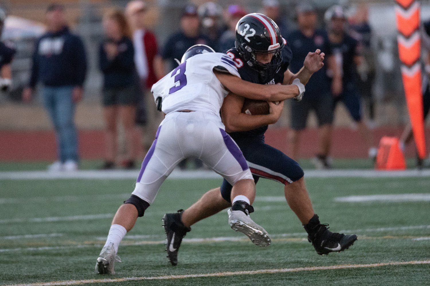 Johnnie Stallings tries to run through a tackle in the first half of Black Hills' 15-0 win over North Thurston on Sept. 8 at South Sound Stadium.