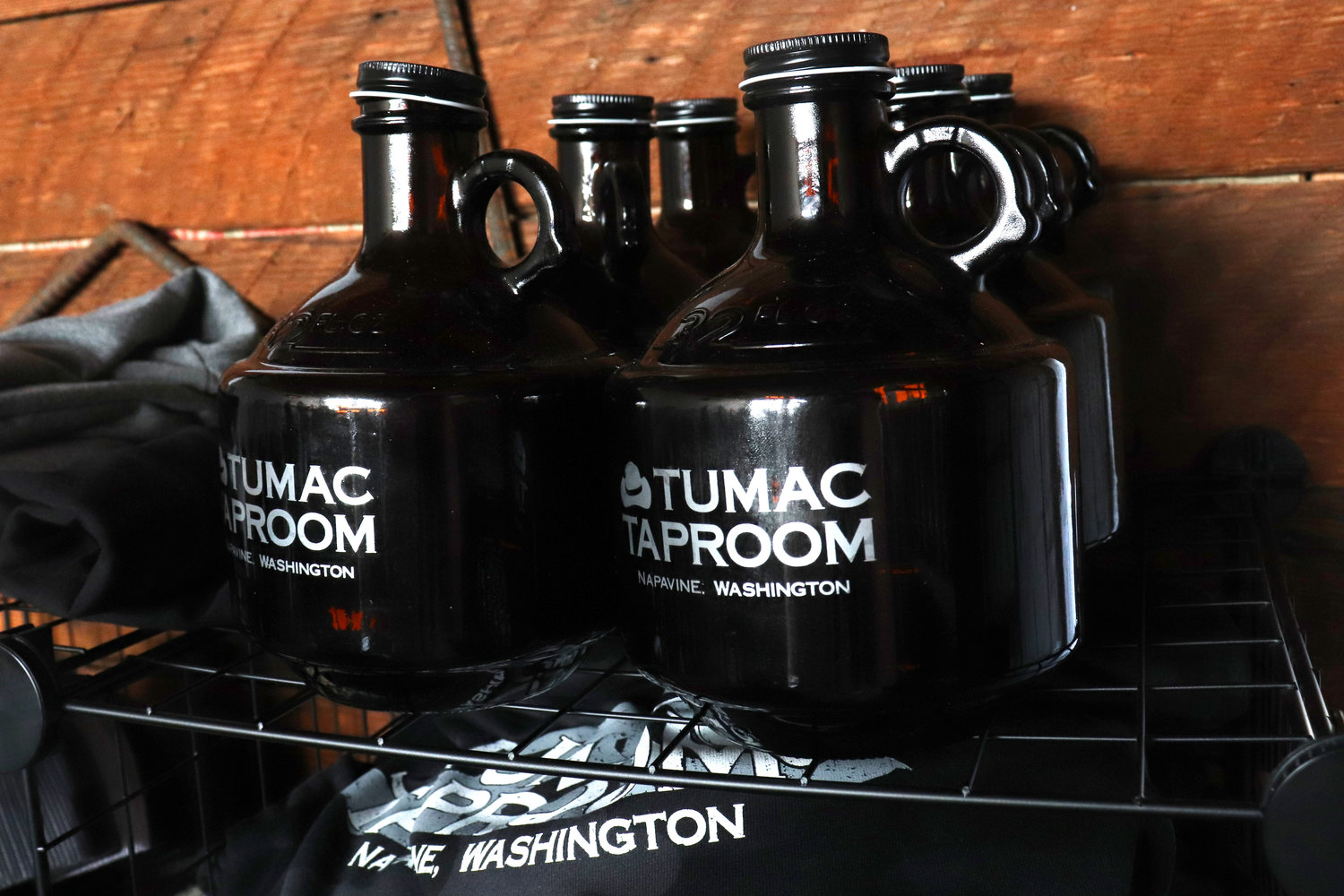 Tumac Taproom merch, including T-shirts and growlers, are on display for sale in Napavine on Friday.