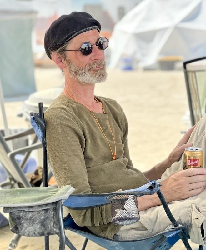 Winlock artist Michael Duquette is pictured during a relaxing moment at the Burning Man festival.
