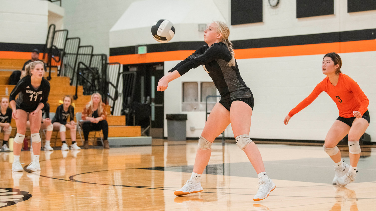 Napavine junior Grace Gall (4) hits a ball up during a volleyball match against Kalama Tuesday night.