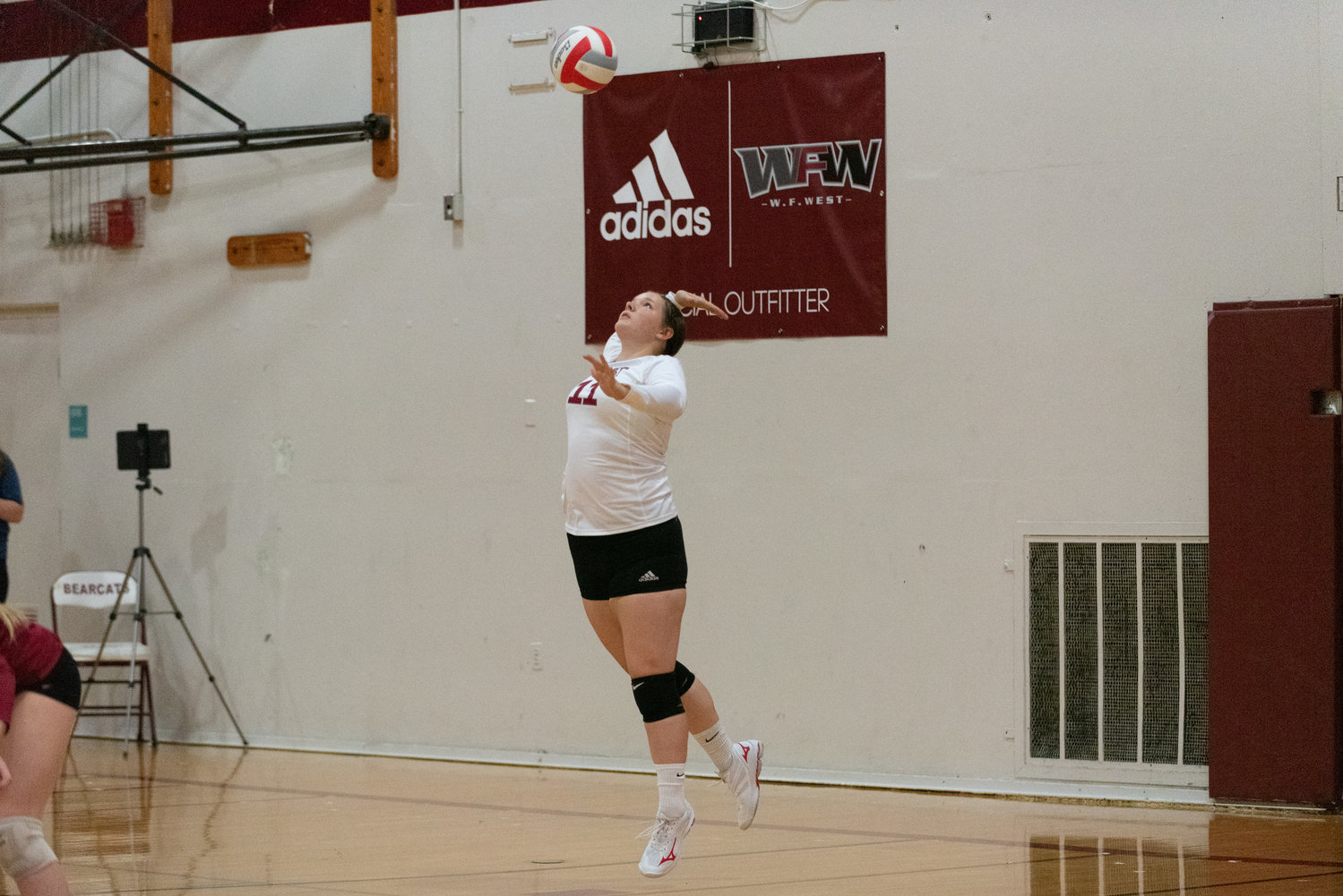 W.F. West's Savannah Hawkins serves the ball in the first set of the Bearcats' five-set win over Centralia on Sept. 22.