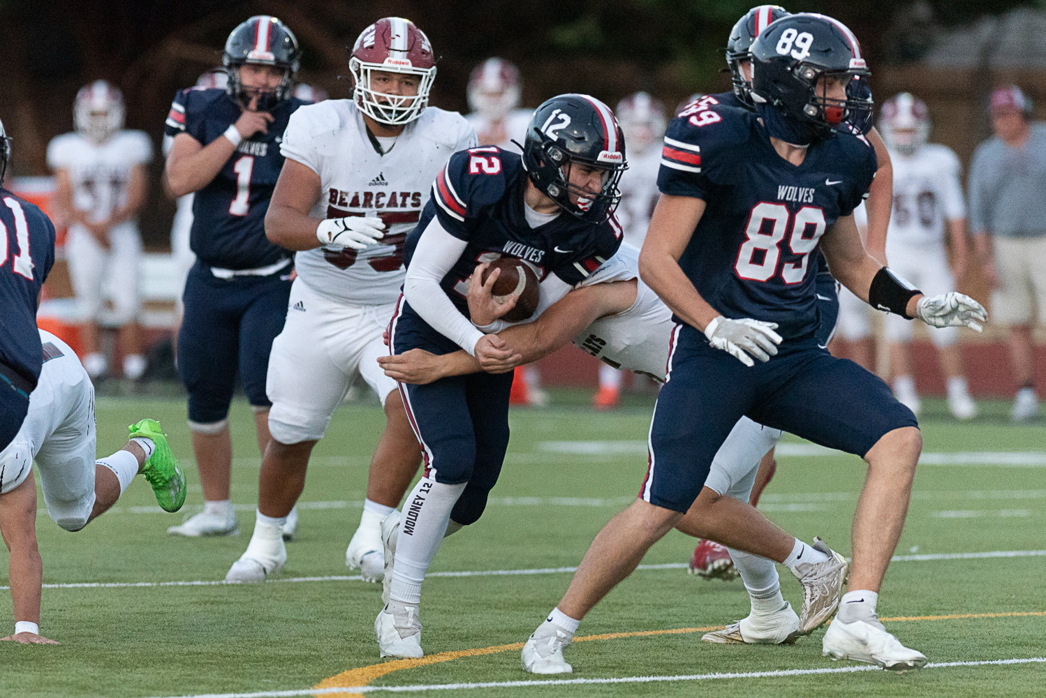 Black Hills tailback Sean Moloney gets positive yardage in the ifrst quarter of the Wolves' 35-0 loss to W.F. West on Sept. 23 at Tumwater District Stadium.