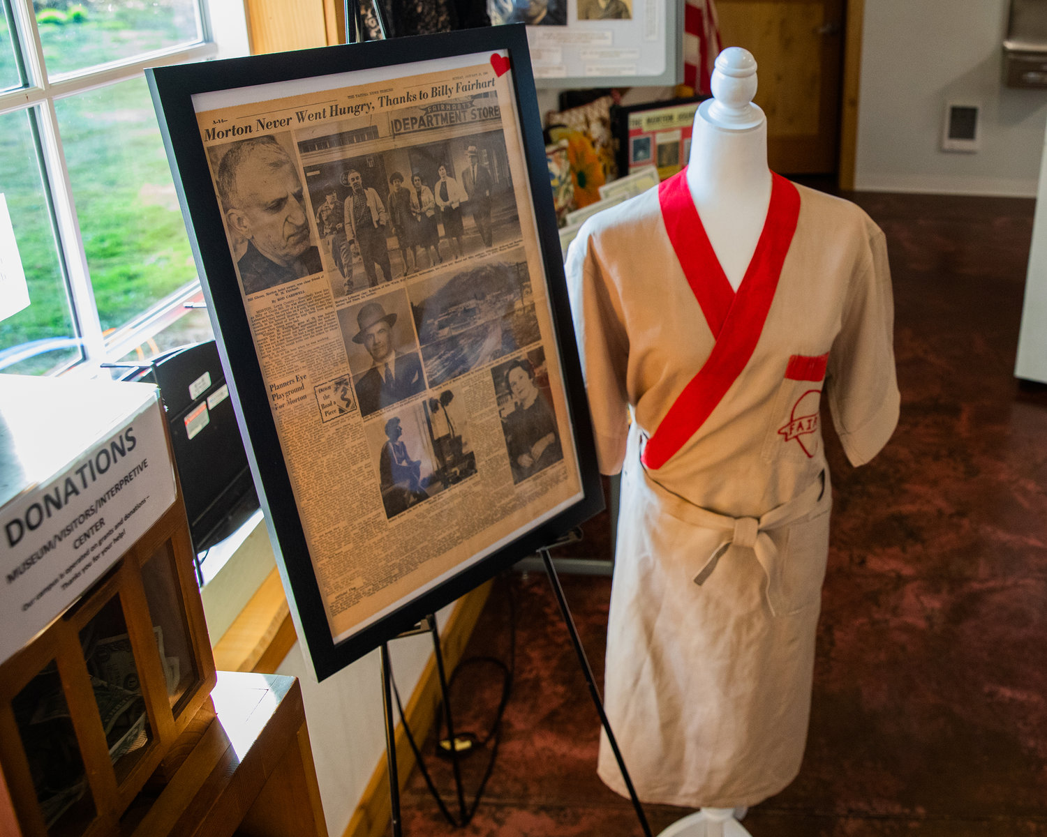 A newspaper article from the Tacoma News Tribune reads, “Morton Never Went Hungry, Thanks to Billy Fairhart,” on display at the Morton Historical Museum.