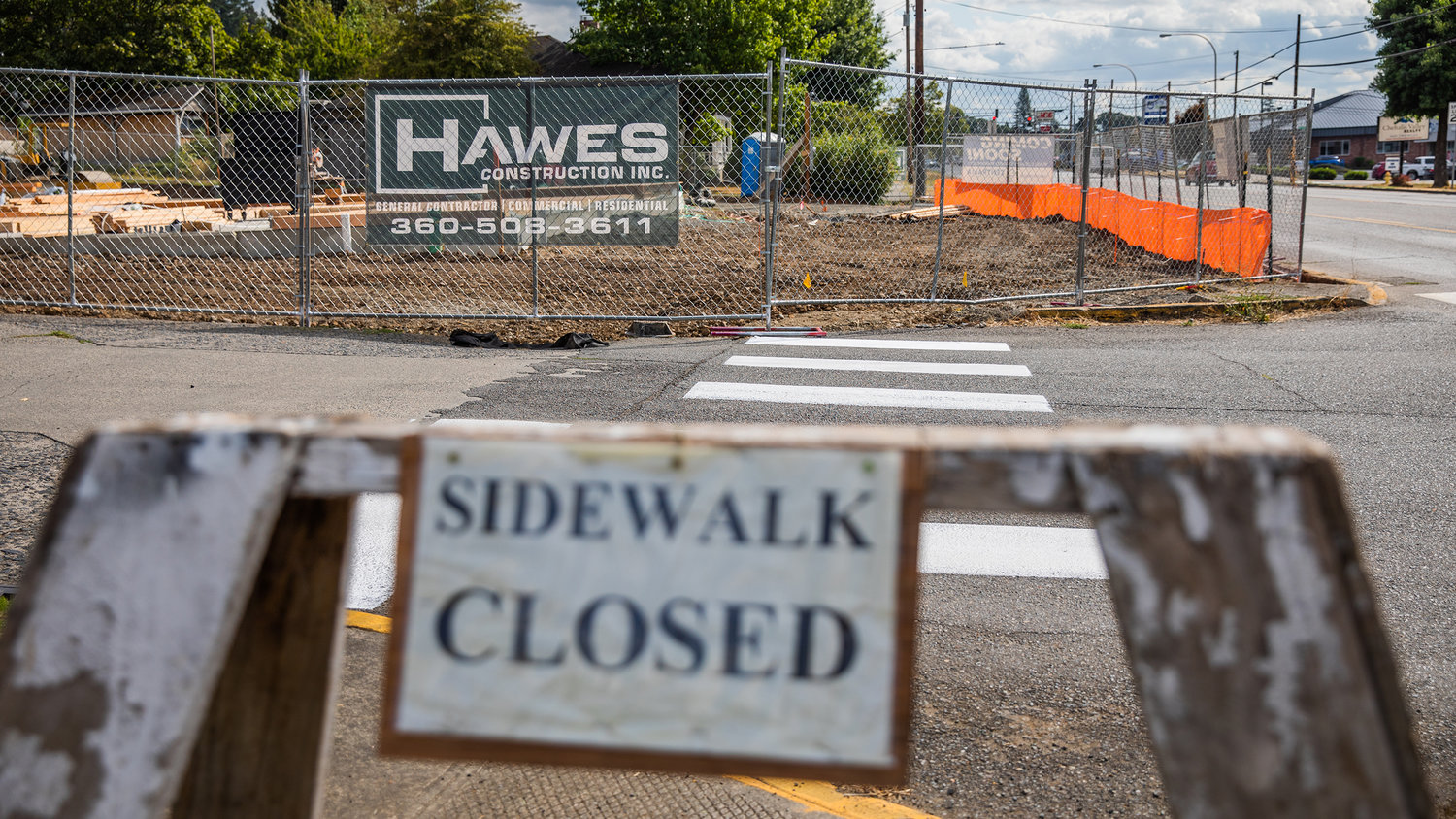 The sidewalk along South Market Boulevard is seen closed for construction on a locally owned pharmacy coming soon to Chehalis.