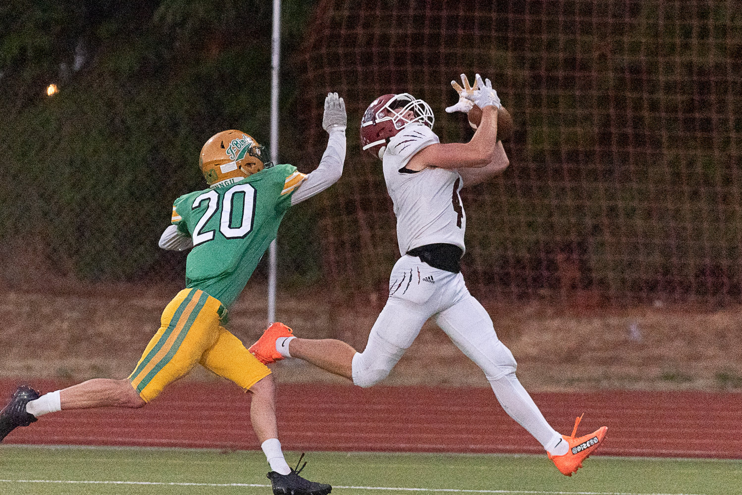 Gavin Fugate's deep throw falls right into Gage Brumfield's hands for a big gain to set up W.F. West's first touchdown in the Bearcats' 28-7 win over Tumwater on Sept. 30.