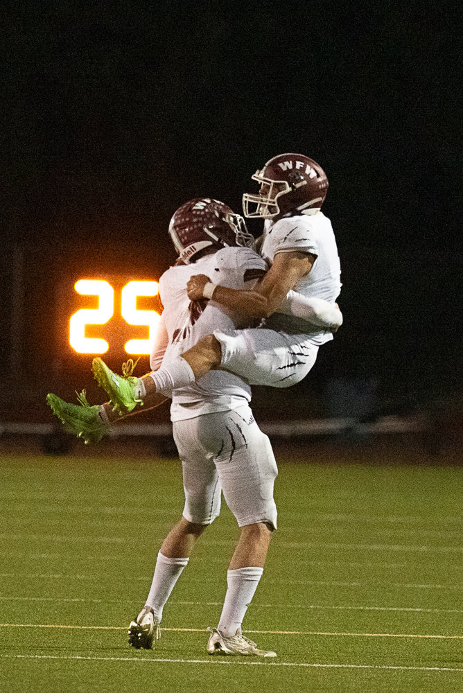 W.F. West Bearcats celebrate their 28-7 win over Tumwater on Sept. 30. It's the first time the Bearcats have beaten the T-Birds since 2009.