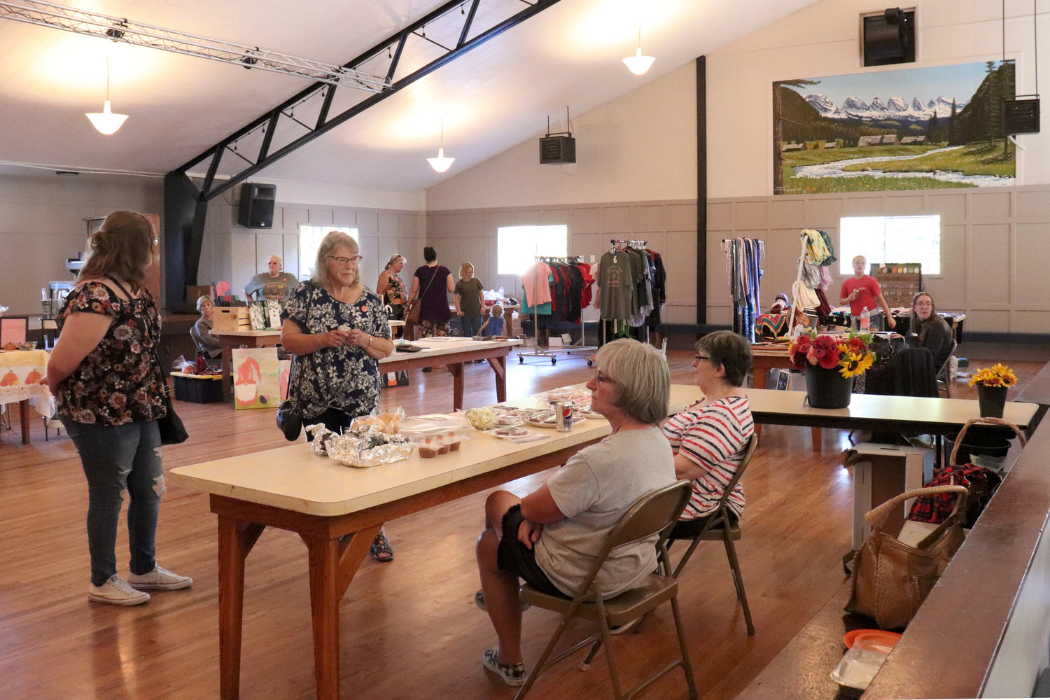 Vendors sell their wares inside Swiss Hall in Frances during the Lewis-Pacific Swiss Society Oktoberfest on Saturday.