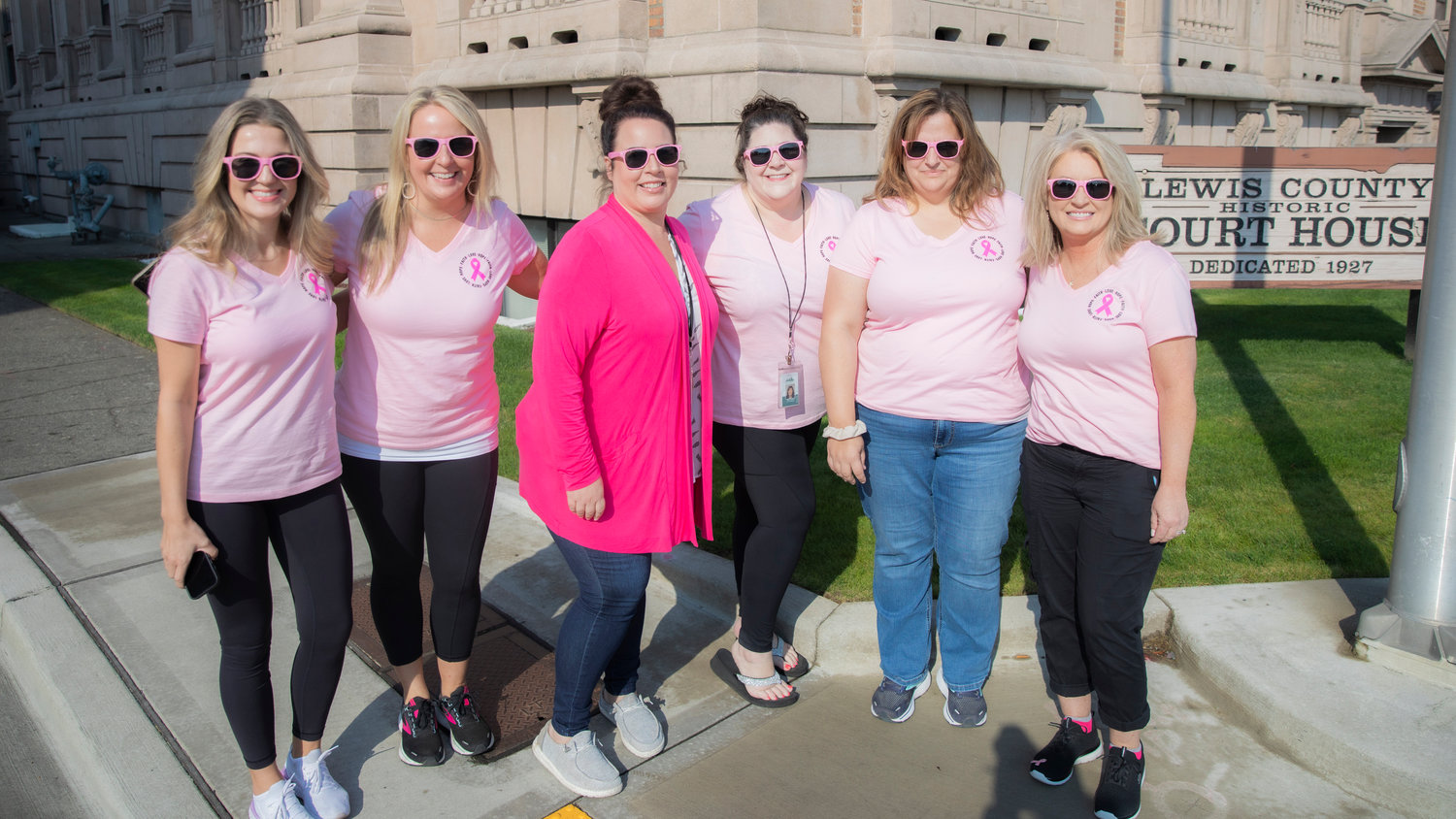 From left, Kate Chatterton, Becky Butler, Rachel and Rieva Lester, Tammy Martin and Lara McRea smile for a photo during a walk for Breast Cancer Awareness Month in Chehalis on Friday.