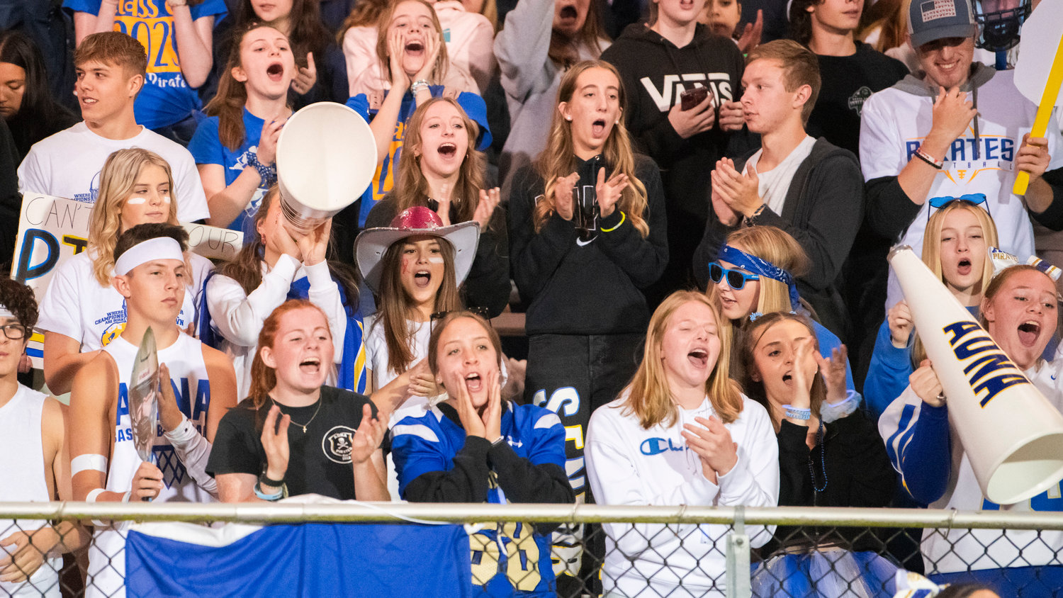 Pirate fans cheer for athletes on homecoming night in Adna.