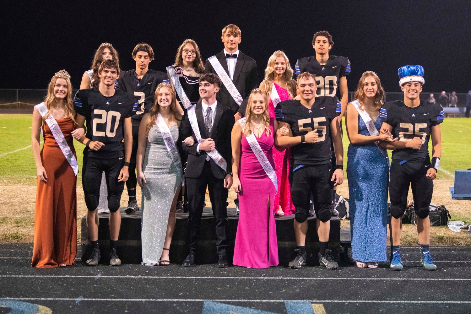 Adna High School homecoming royalty poses for a photo at Pirate Stadium Friday night during a football game against Toledo.