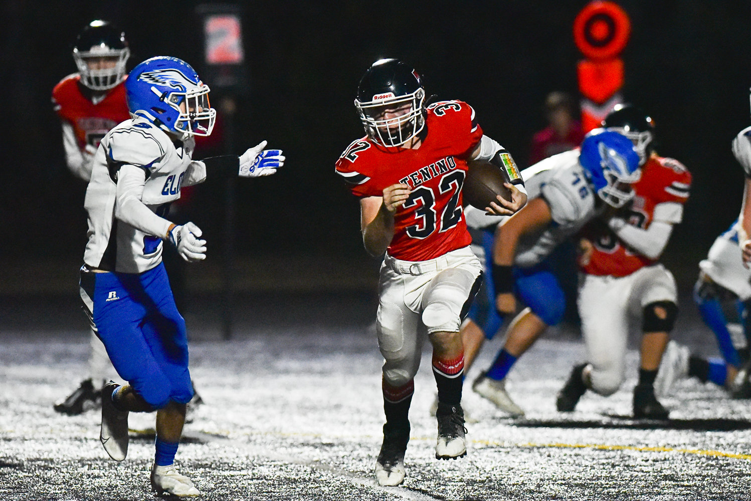 Blaine Schott carries the ball for Tenino during the Beavers' 66-26 win over Elma on Oct. 14.